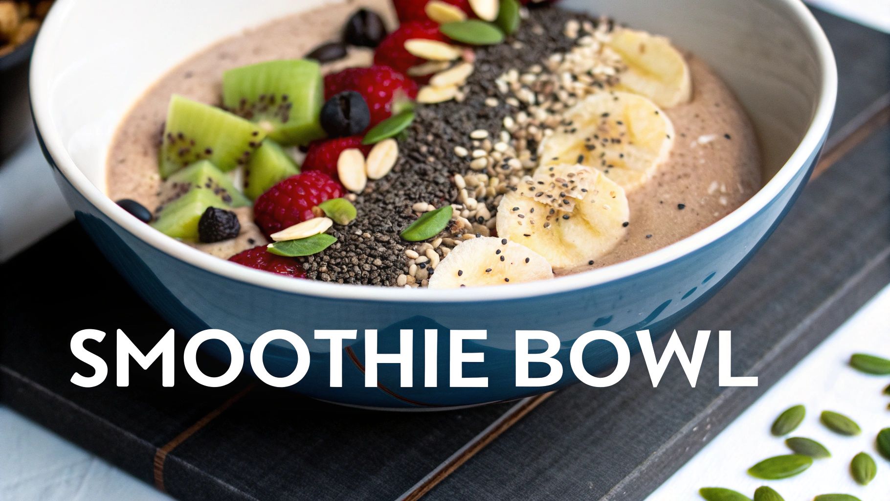 A vibrant and healthy smoothie bowl overflowing with fresh fruits, nuts, and seeds.