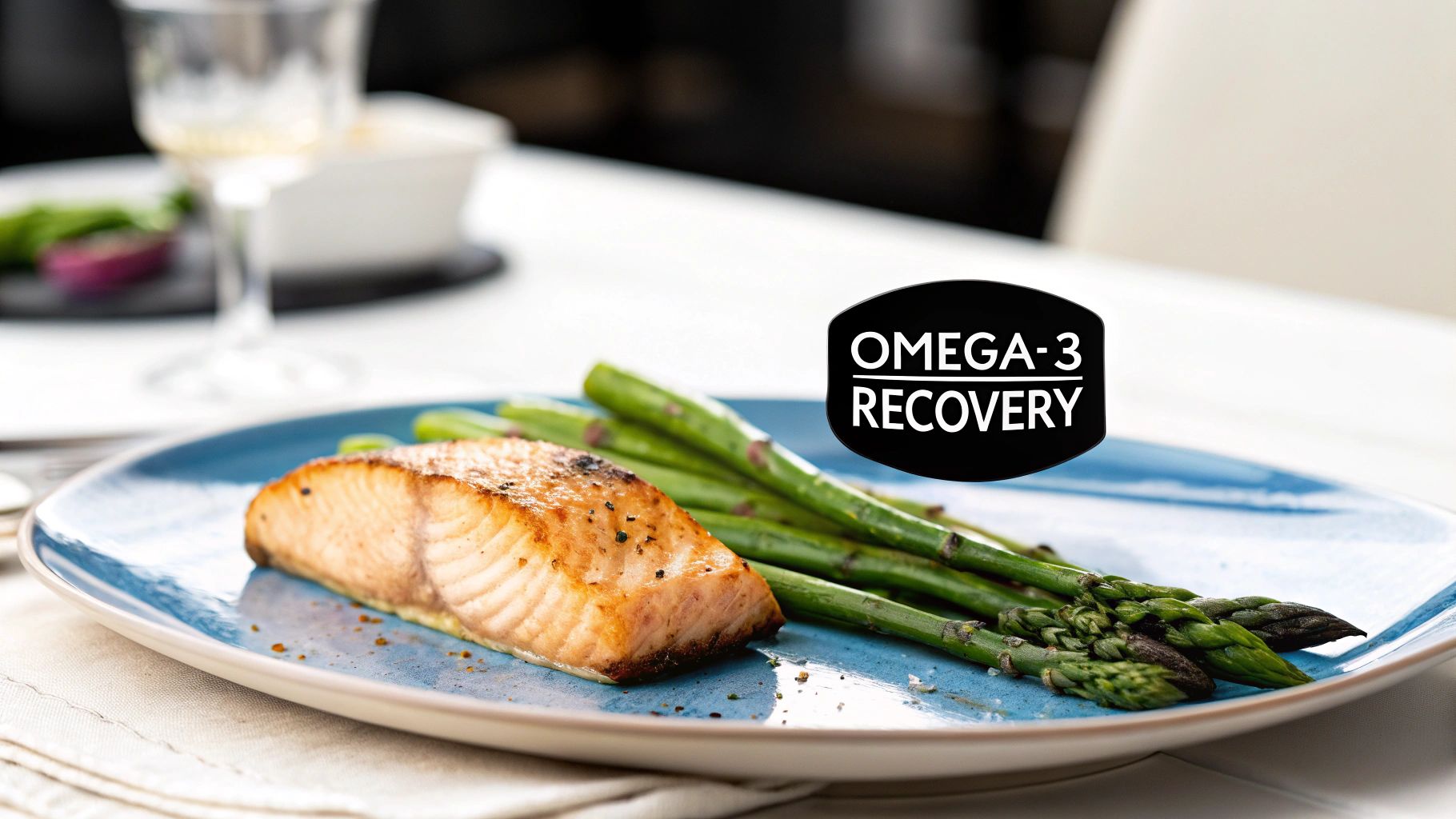 A perfectly cooked salmon fillet with fresh green asparagus on a blue plate, promoting Omega-3 recovery.