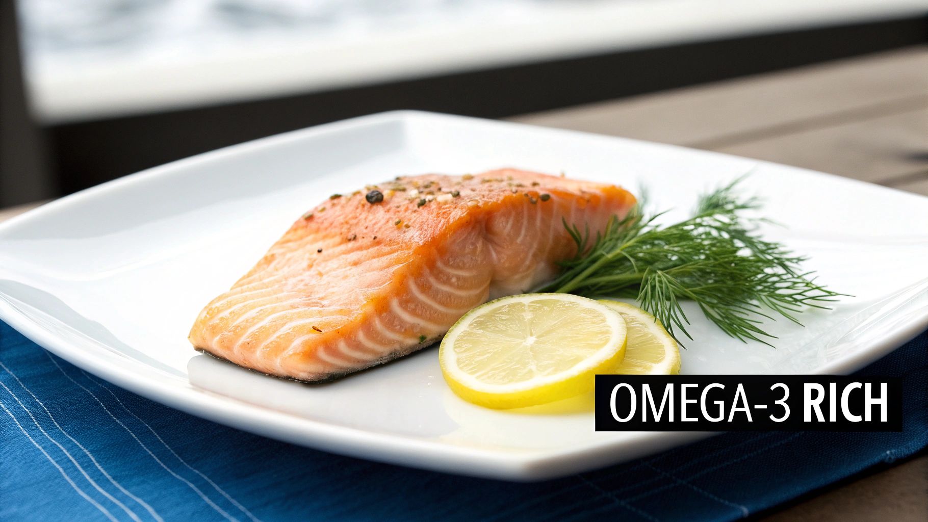 A delicious pan-seared salmon fillet on a white plate, garnished with fresh lemon slices and dill, indicating it's omega-3 rich.