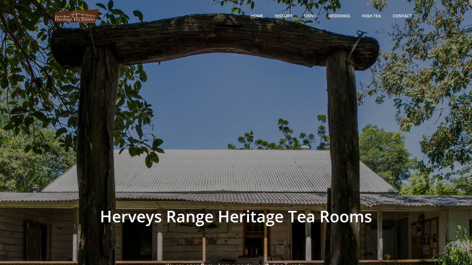 The charming heritage building of Herveys Range Heritage Tea Rooms, set amongst gardens.
