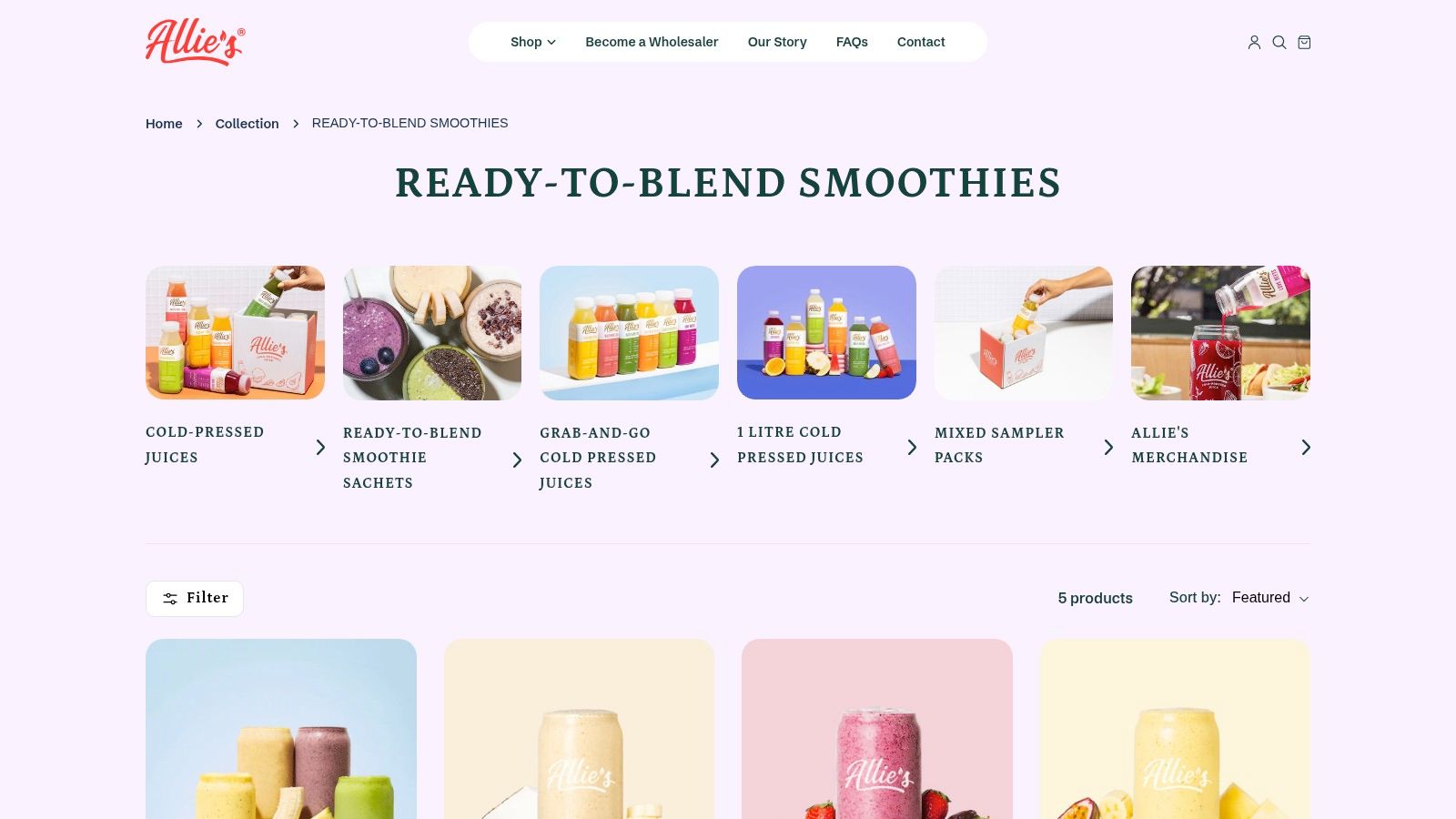 A display of Allie’s Cold Pressed Juices ready-to-blend smoothie sachets, showing various colourful flavours like mango, berry, and green smoothies.