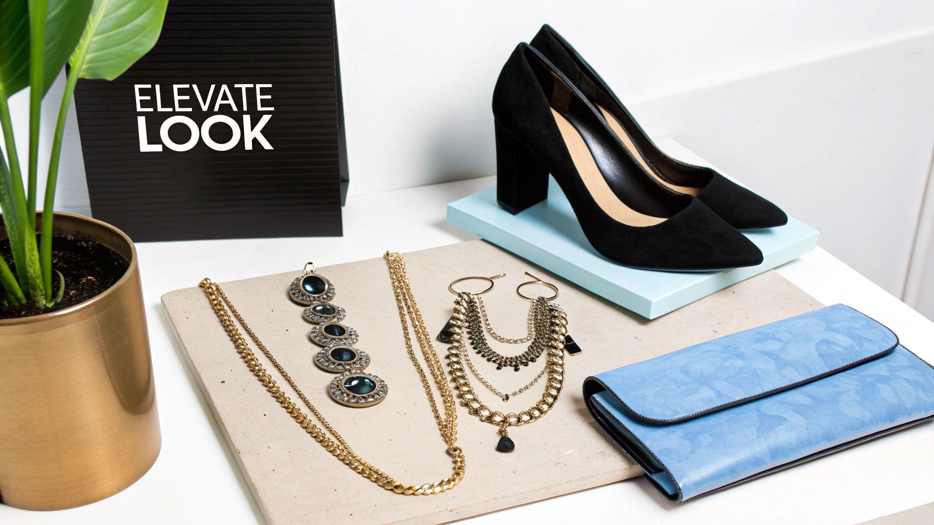 Black high heels, gold necklaces, a blue clutch, and other fashion accessories for an elevated look.