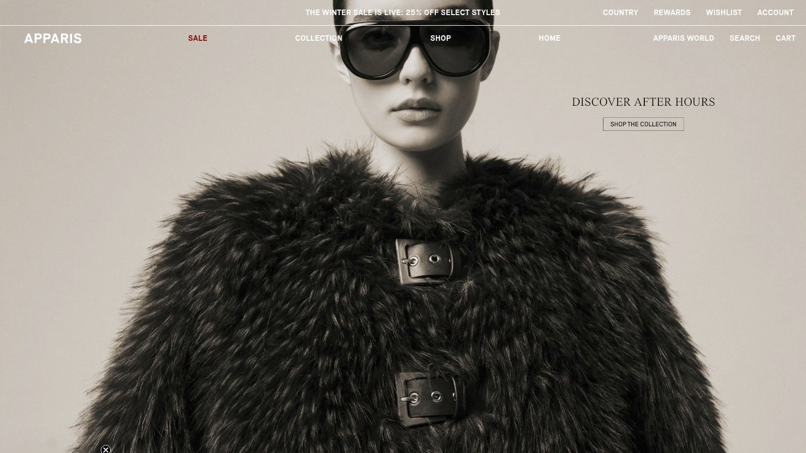 A woman wearing a stylish, light-colored mini fur jacket from Apparis, showcasing its plush texture and cropped silhouette.