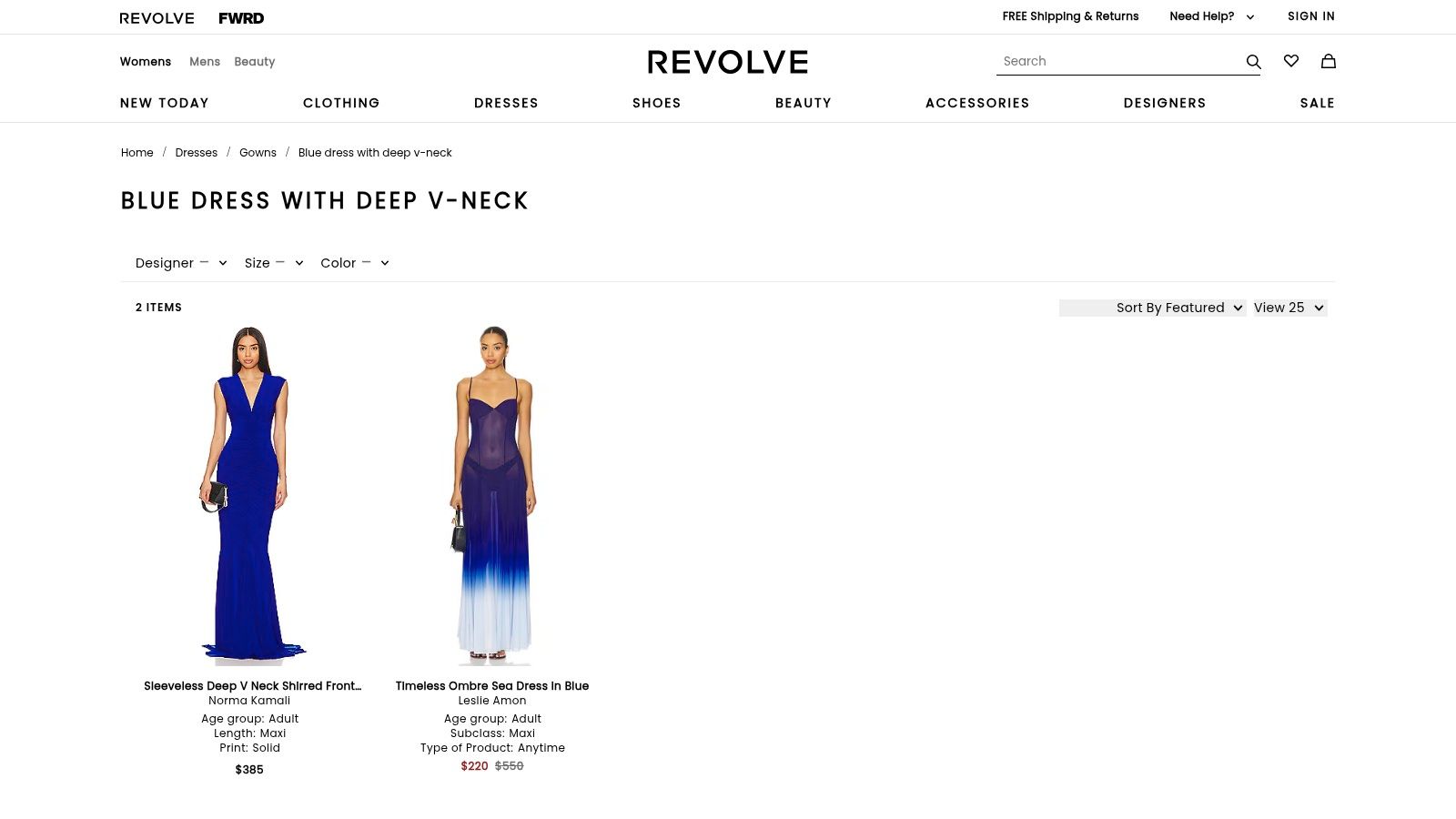 A woman wearing a blue dress with deep v neck from REVOLVE