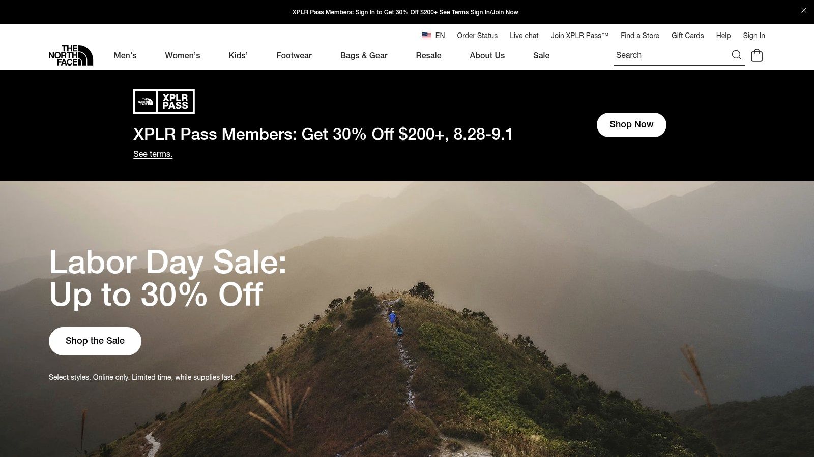 A screenshot of The North Face website showcasing its iconic black puffer coats with hoods