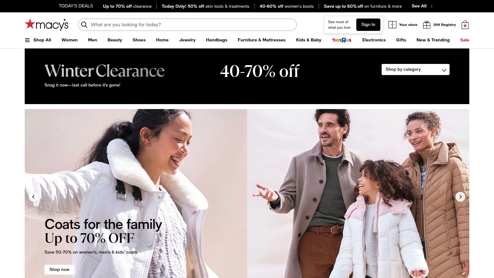 Macy's website showcasing a sale on lace one piece jumpsuits.