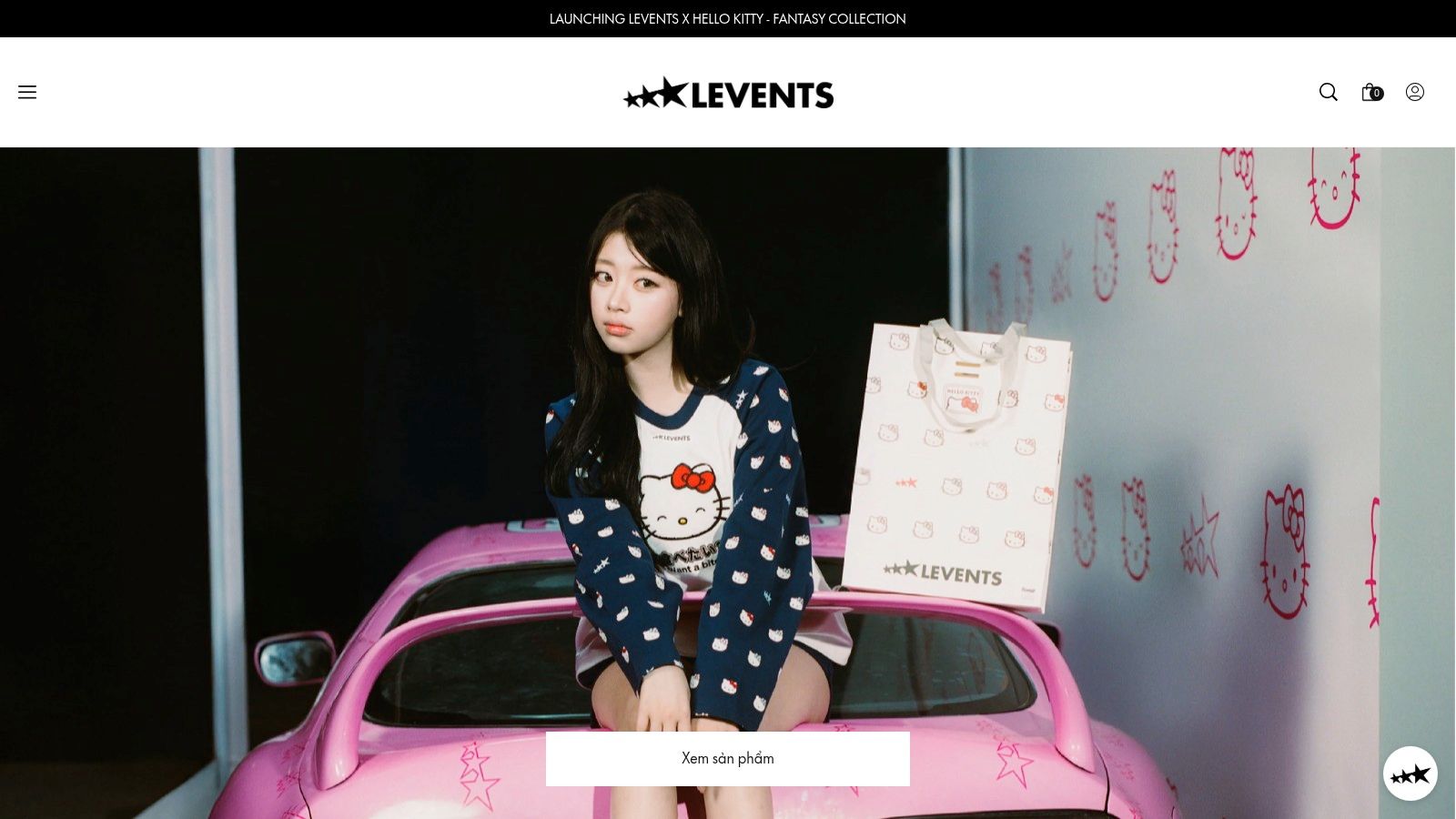 A model wears a playful, oversized T-shirt from a Levents x Hello Kitty collaboration, showcasing the brand's popular streetwear style.