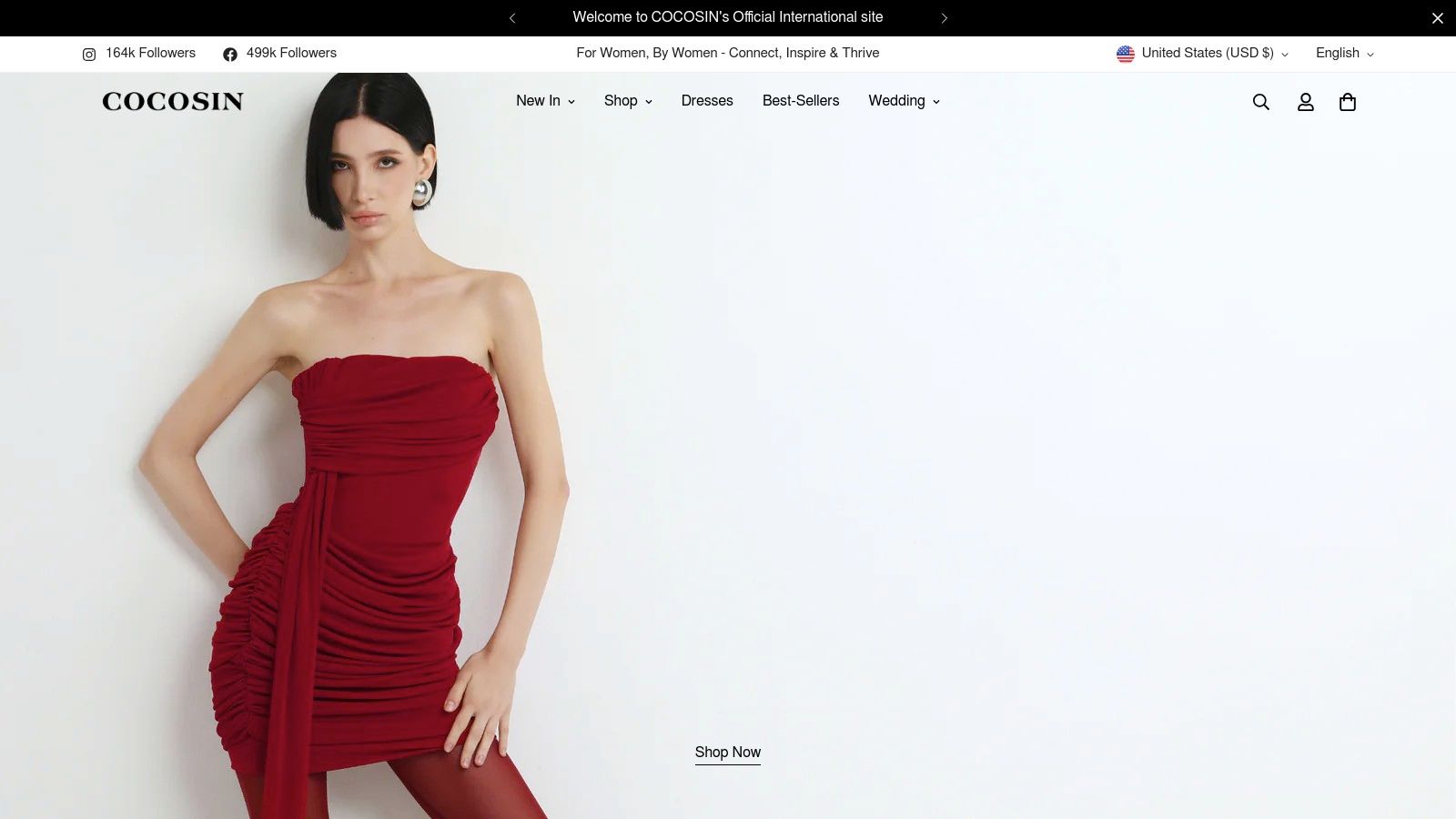A woman wearing a vibrant red, off-the-shoulder dress from COCOSIN, showcasing the brand's feminine and modern aesthetic.