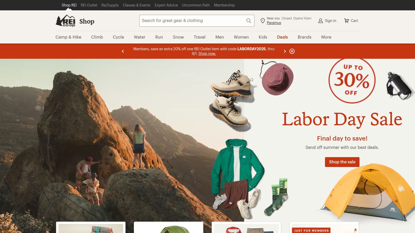 A screenshot of the REI Co-op website featuring a selection of technical black puffer coats with hoods