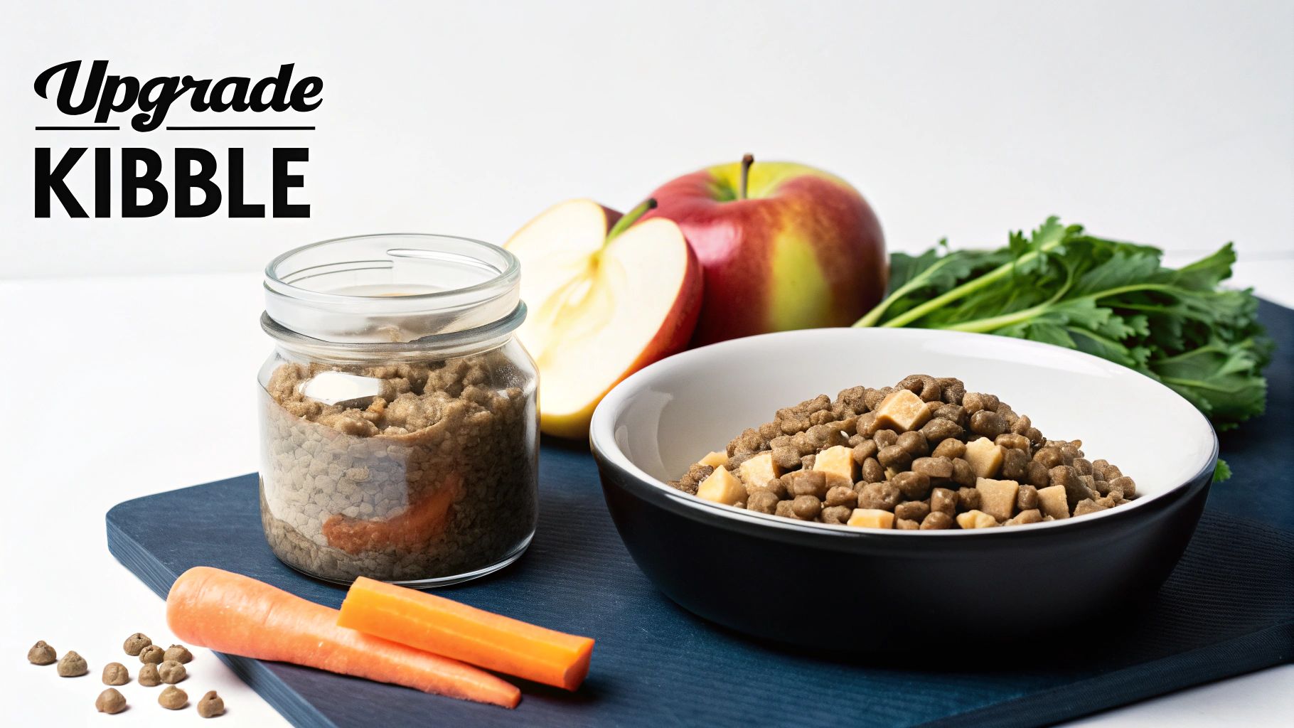 A dog's meal of kibble with fresh apples, carrots, and greens on a blue board.