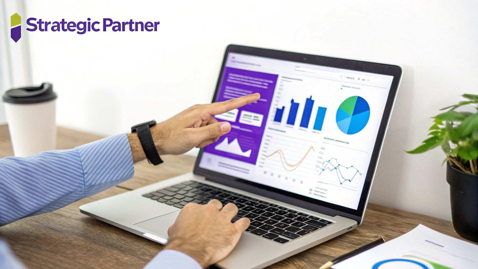 Person pointing at a laptop screen displaying business charts and graphs, analyzing data.