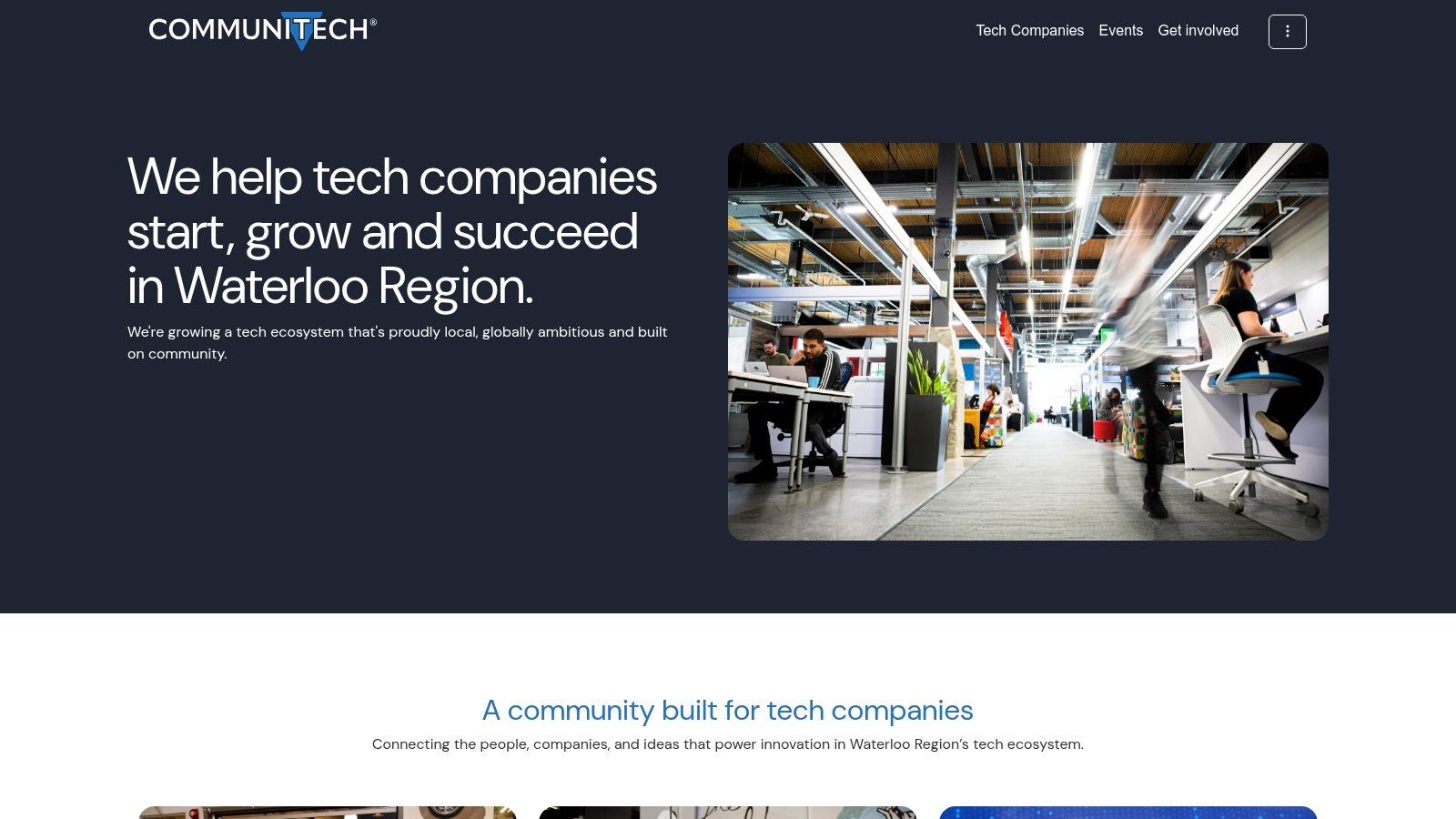 The modern and collaborative interior of the Communitech Hub in Kitchener, showing people working and meeting in an open-concept space.