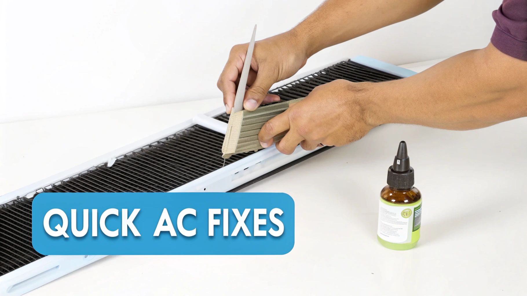 A person's hands using a tool to clean the coils of an RV air conditioning unit.