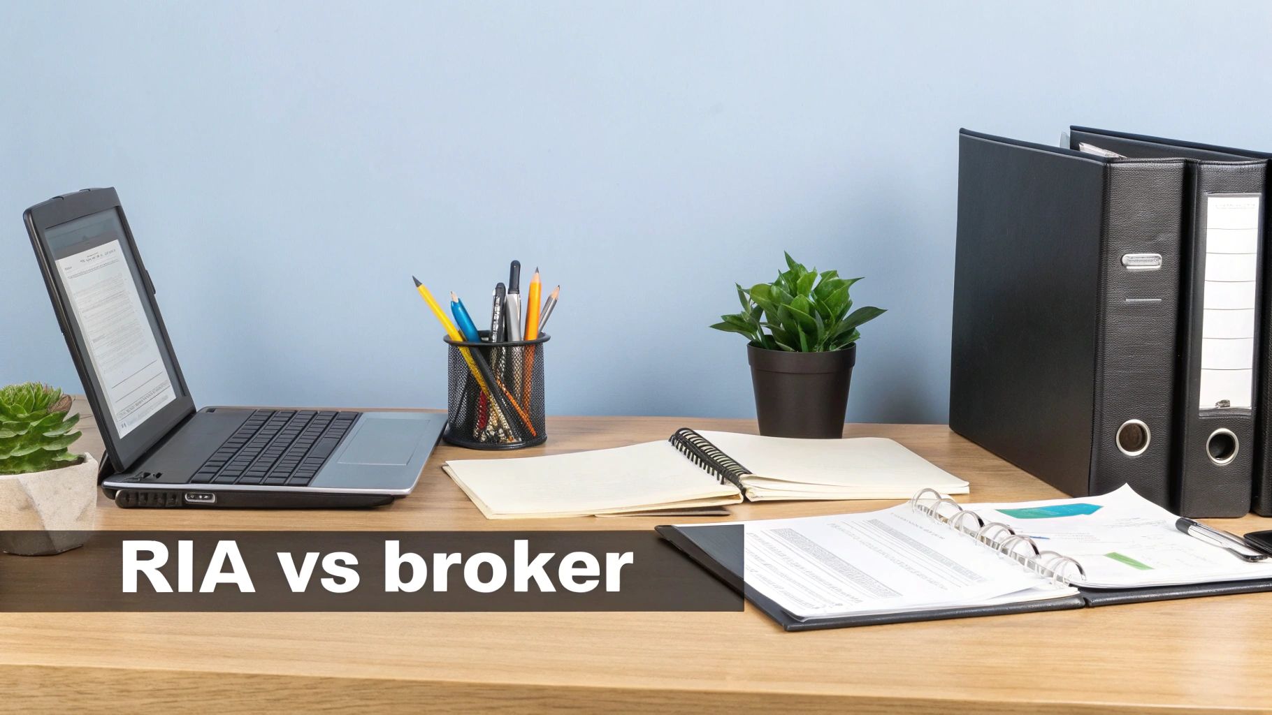An office desk setup with a laptop, plant, office supplies, and documents, with text 'RIA vs broker'.