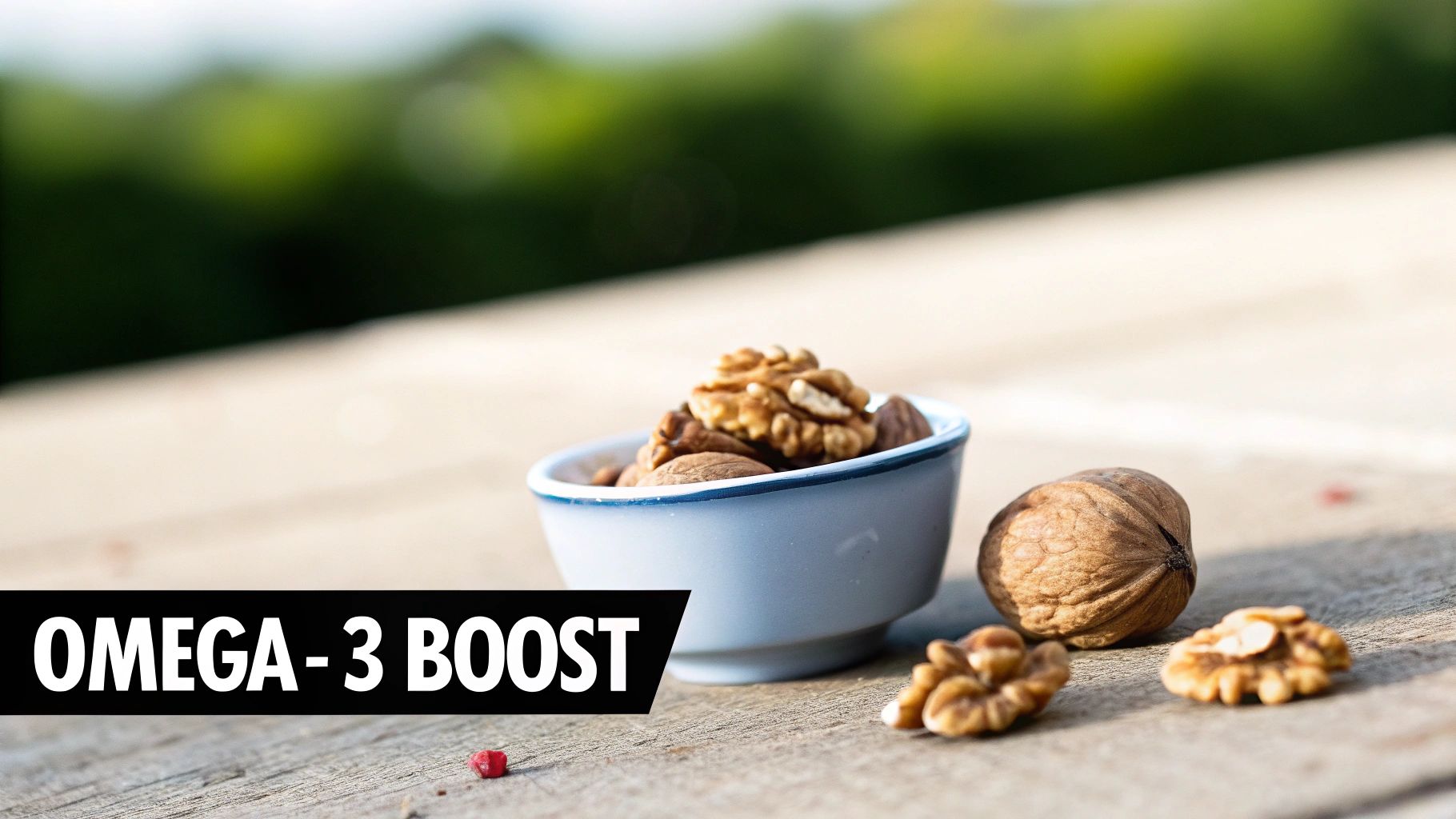 A small bowl of walnuts and almonds, with loose walnuts, on a wooden table, labeled 'OMEGA-3 BOOST'.