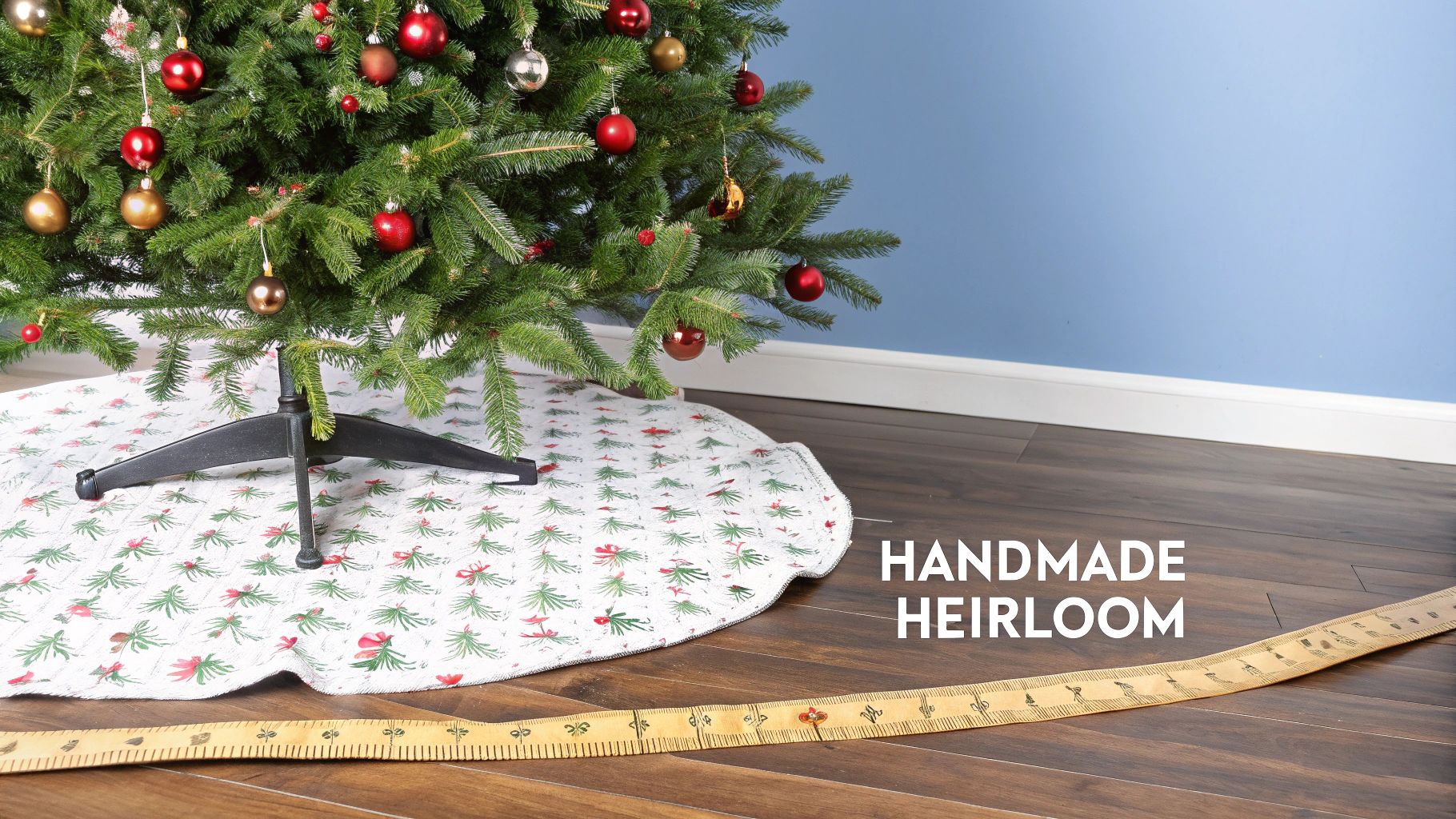 A Christmas tree decorated with red and gold ornaments, a festive patterned tree skirt, and a wooden ruler on a floor.