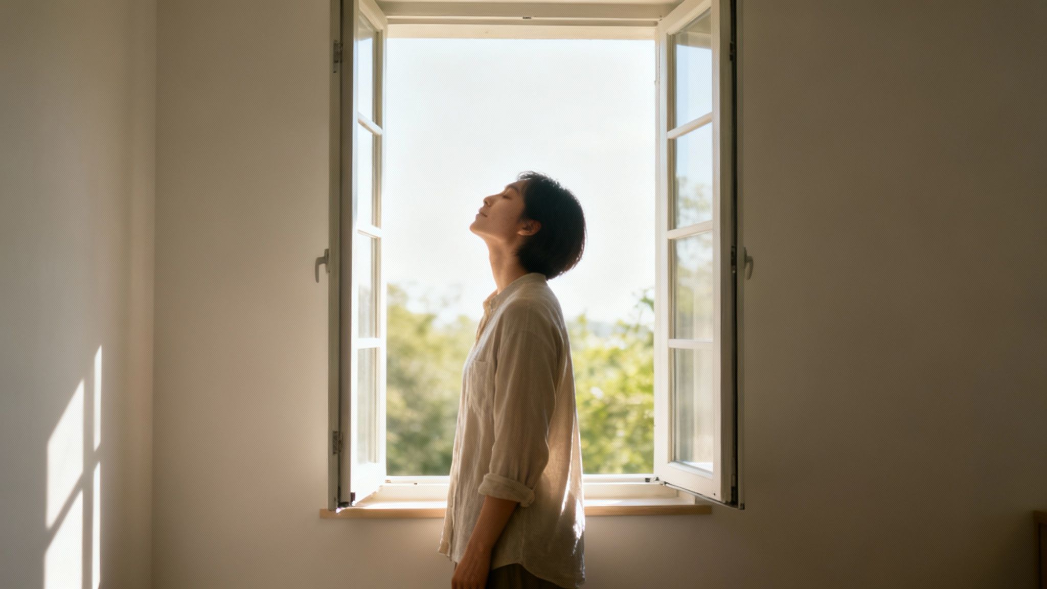 A person enjoying fresh air outdoors, symbolizing a reset for the senses.