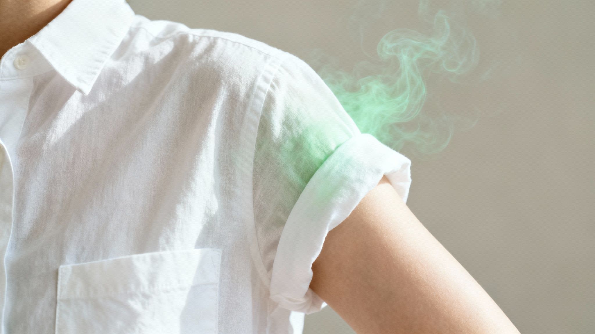 Person smelling a 'clean' but still smelly shirt