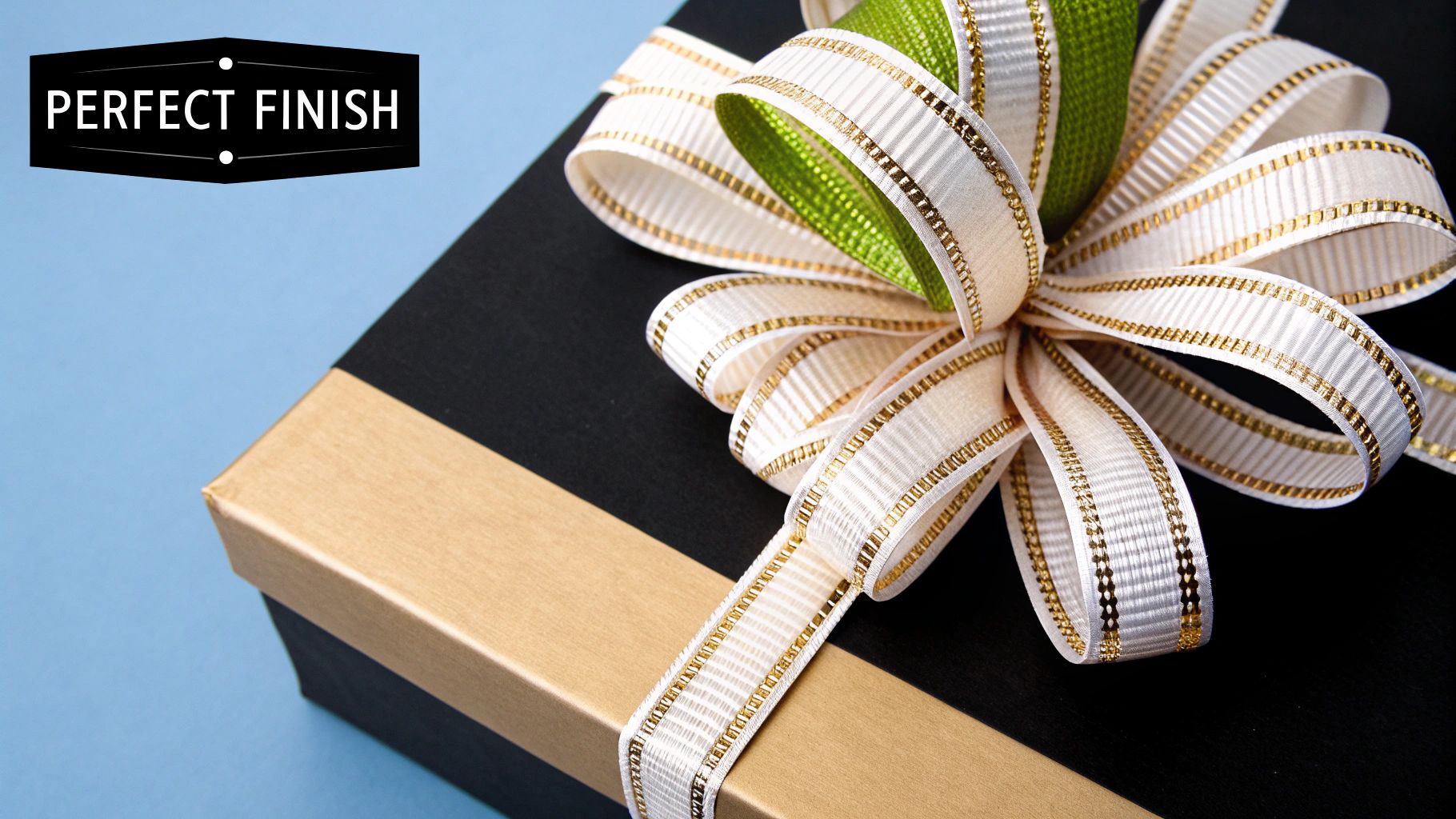 A perfectly fluffed and finished wired ribbon bow attached to a Christmas present.