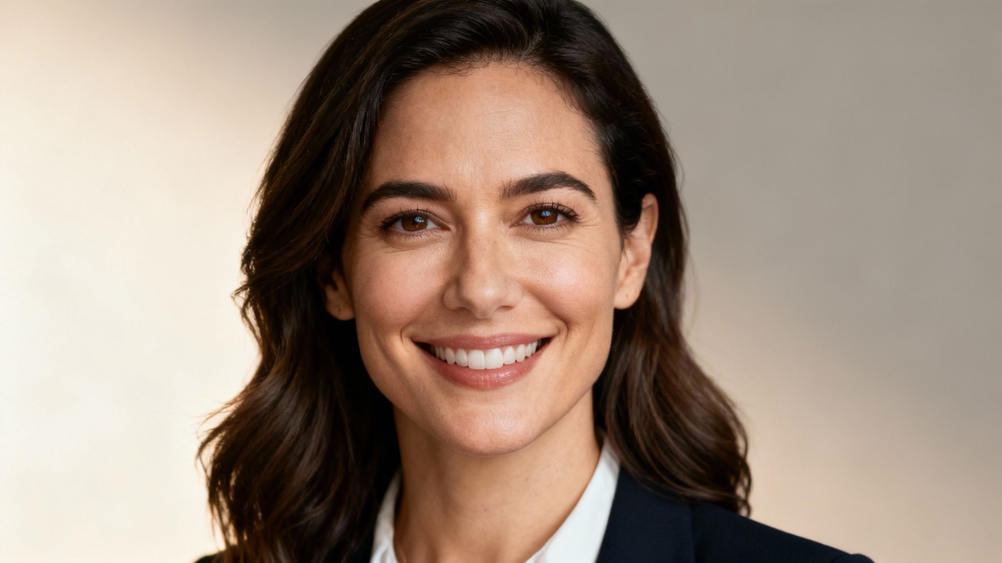 A professional AI-generated headshot of a woman in a business suit, suitable for LinkedIn.