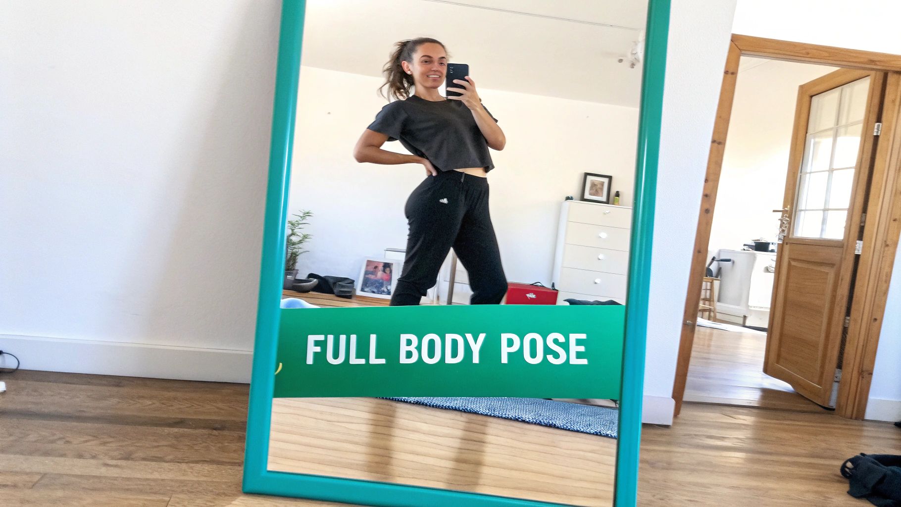 A group of friends taking a selfie together, all smiling and looking happy