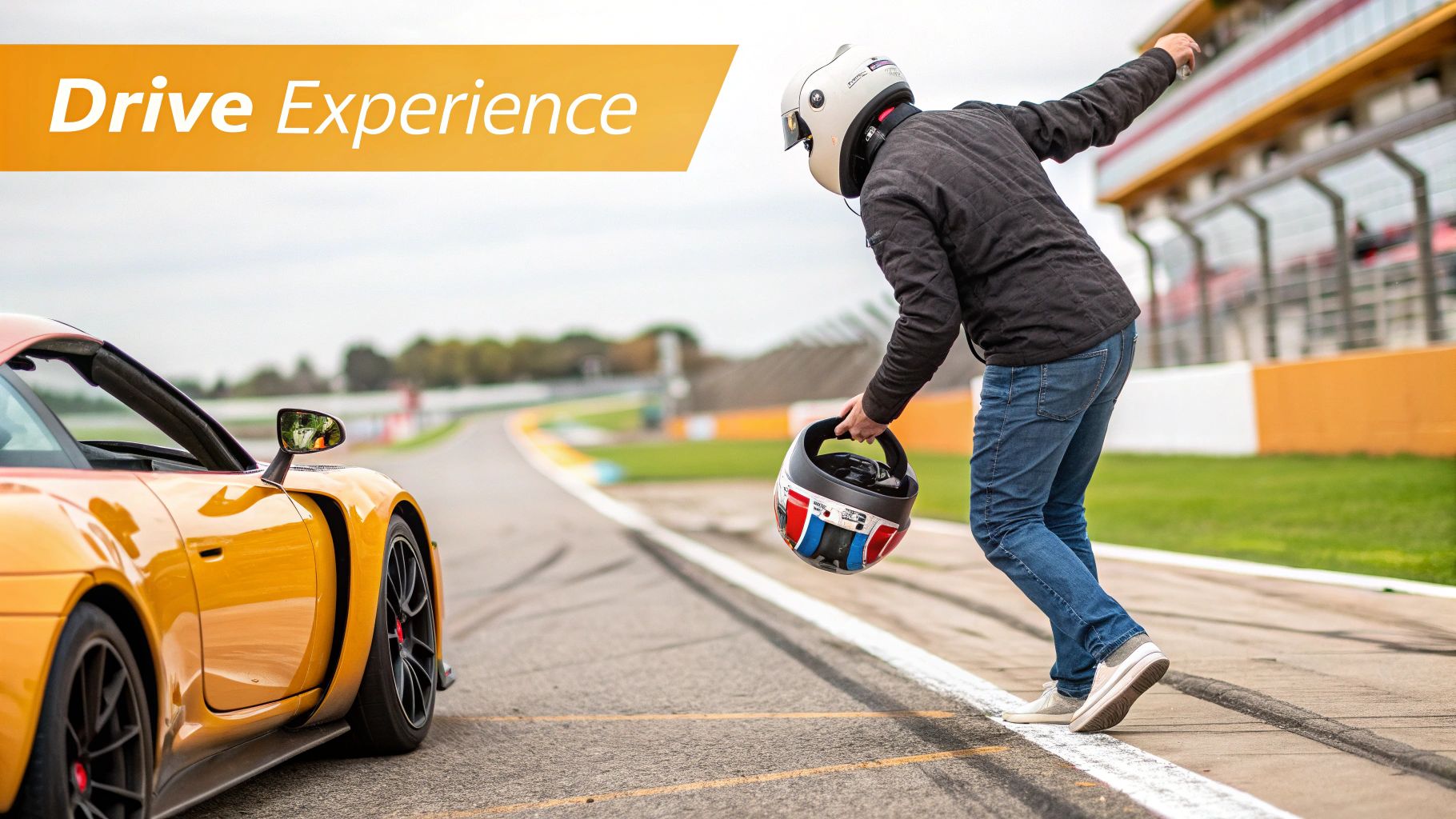 A person in a racing helmet walks away from an orange sports car on a race track, holding a helmet.