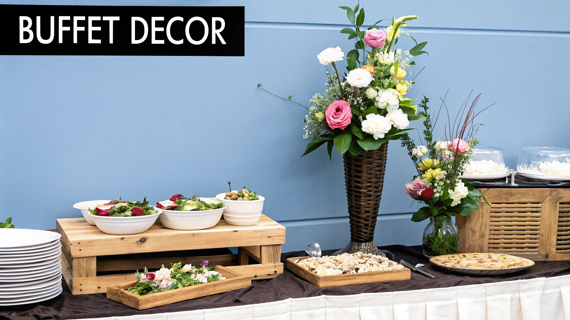 A visually appealing buffet table featuring dishes at various heights using stands and platters.