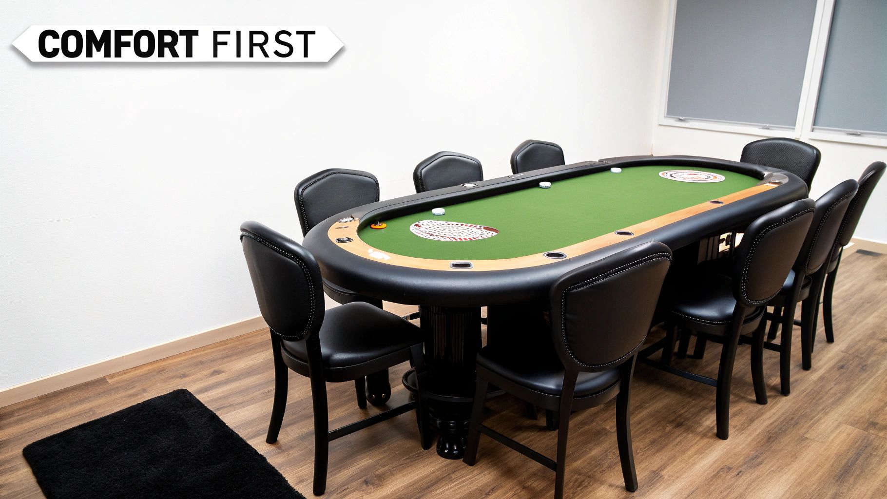 Indoor shot of a 10-seater poker table with green felt and black leather chairs, promoting comfort.