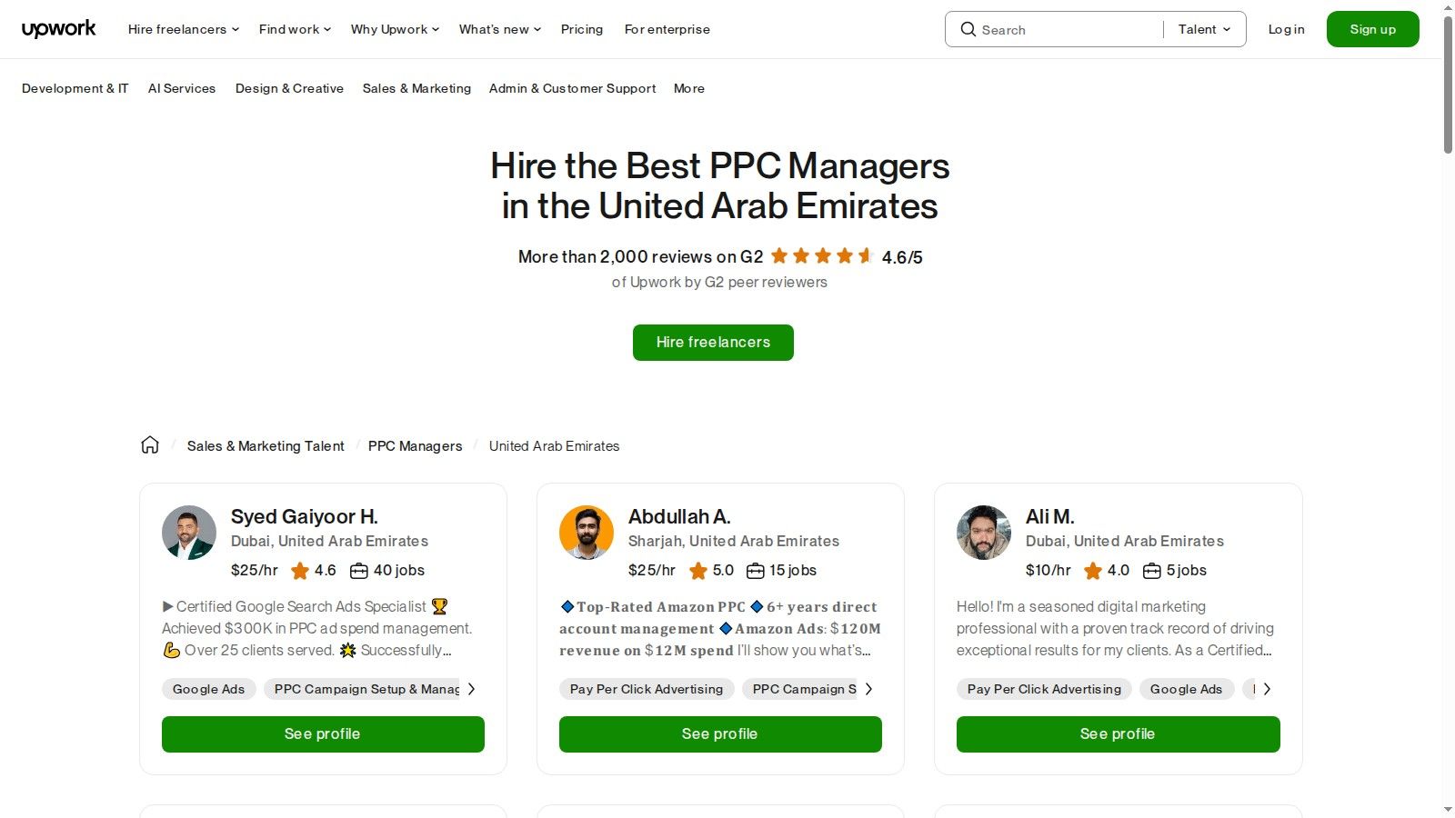 A screenshot of the Upwork platform displaying profiles of PPC freelancers in the UAE, showing their hourly rates, job success scores, and specialisations.