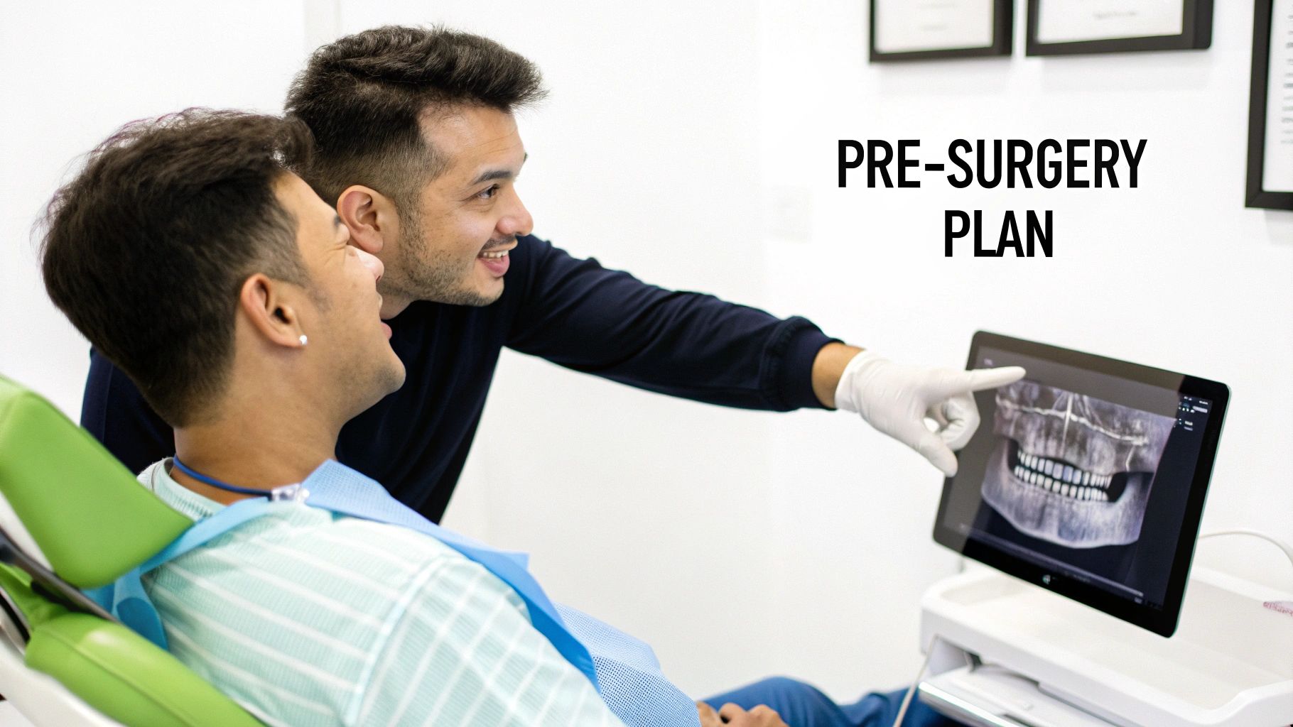 A dentist and patient review a digital dental X-ray for a pre-surgery plan.