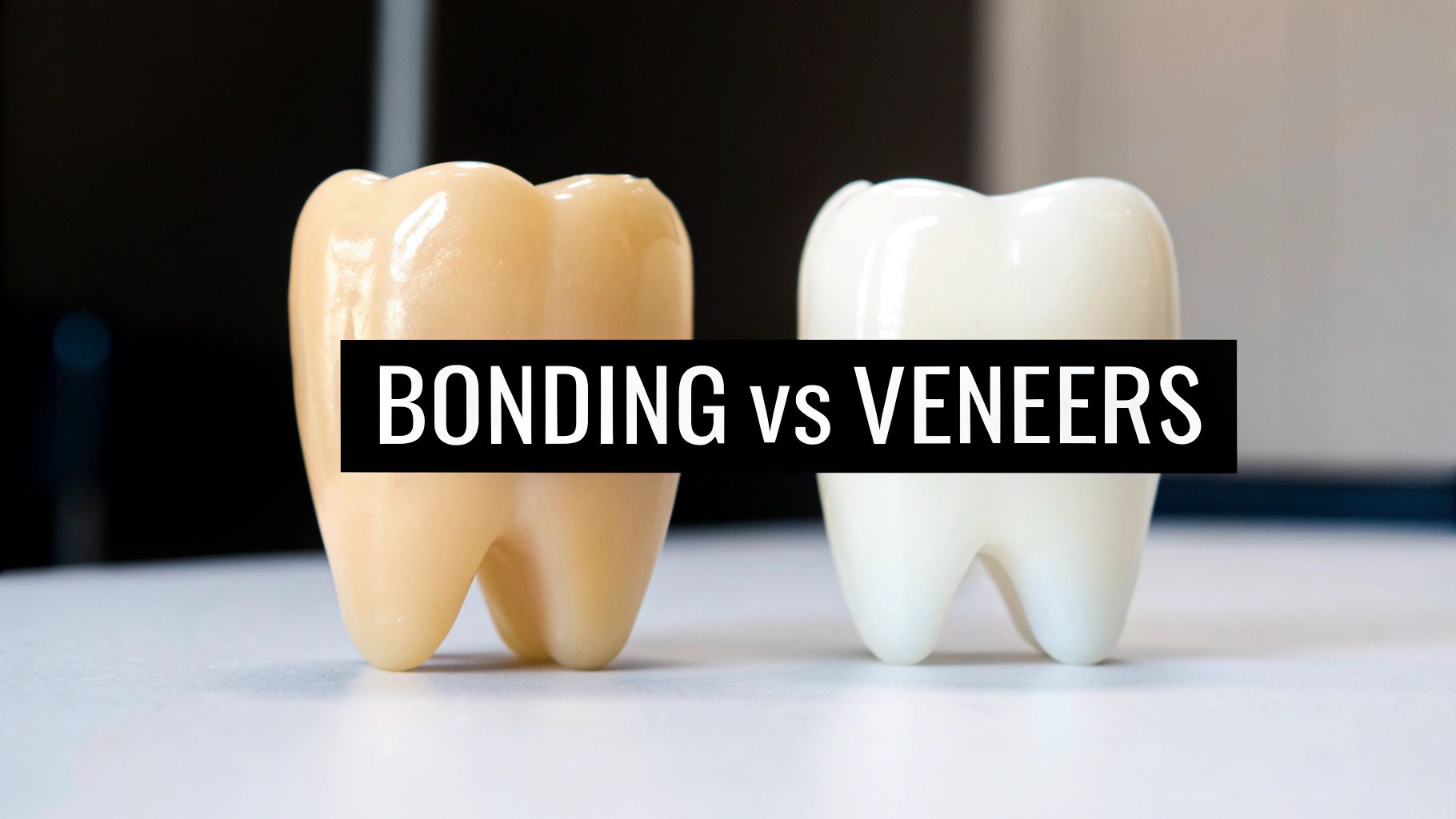 Two model teeth, one yellowish and one white, with 'BONDING vs VENEERS' text overlay.