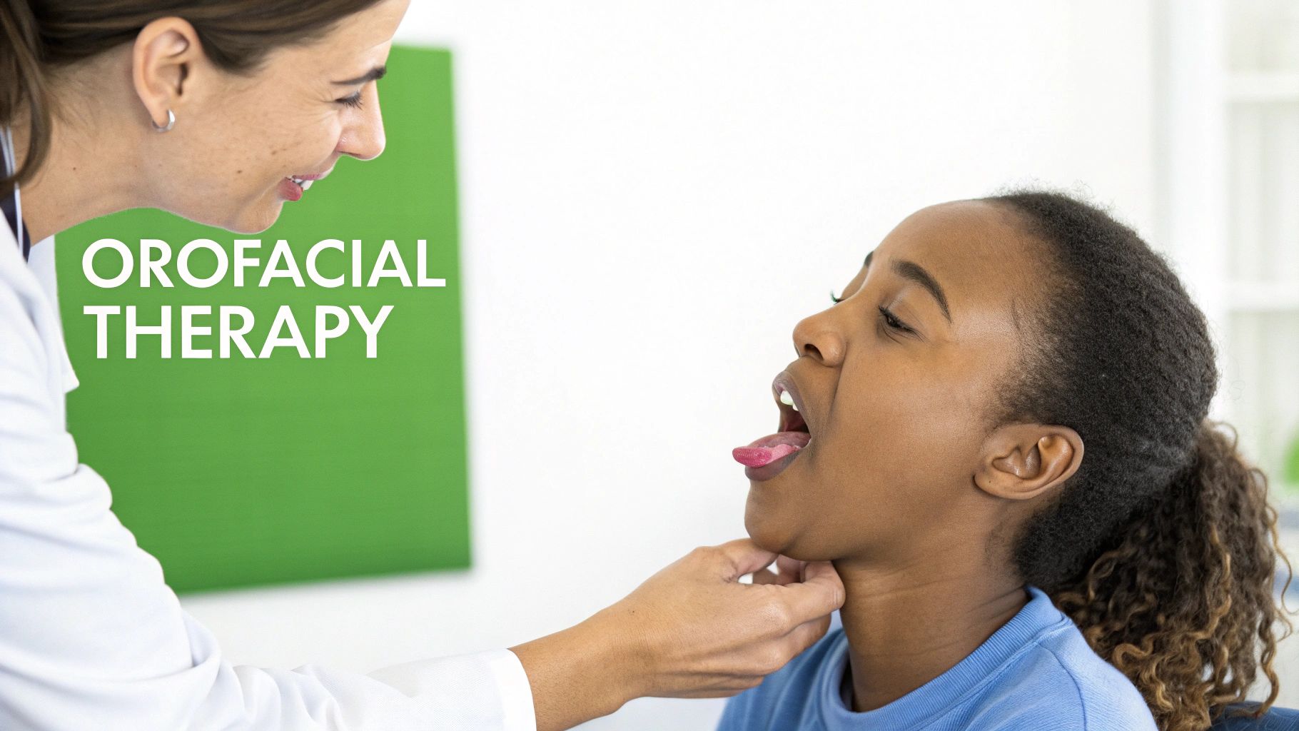 A smiling female therapist examines a young Black girl's mouth and tongue for orofacial therapy.