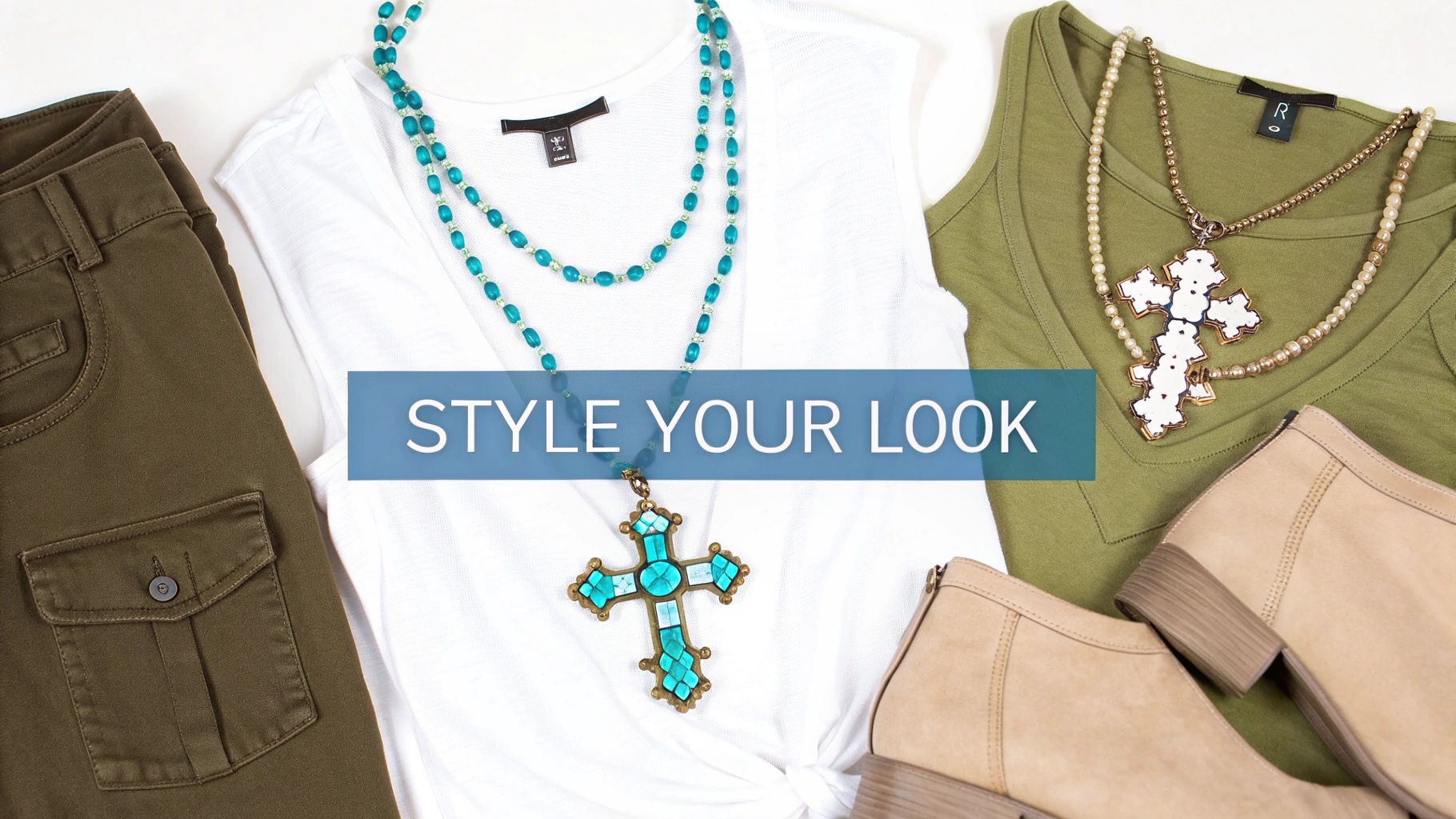 A flat lay of women's fashion featuring olive green pants, white top, turquoise cross necklace, olive top, and boots.