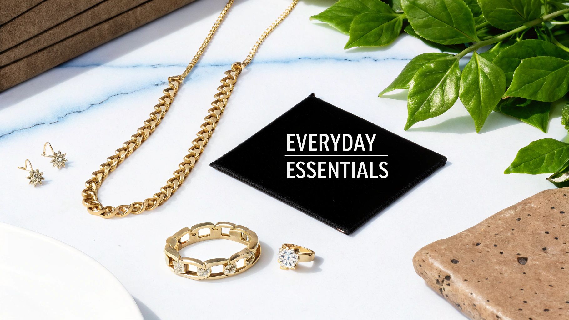 A woman wearing layered necklaces and rings, showcasing everyday jewelry.