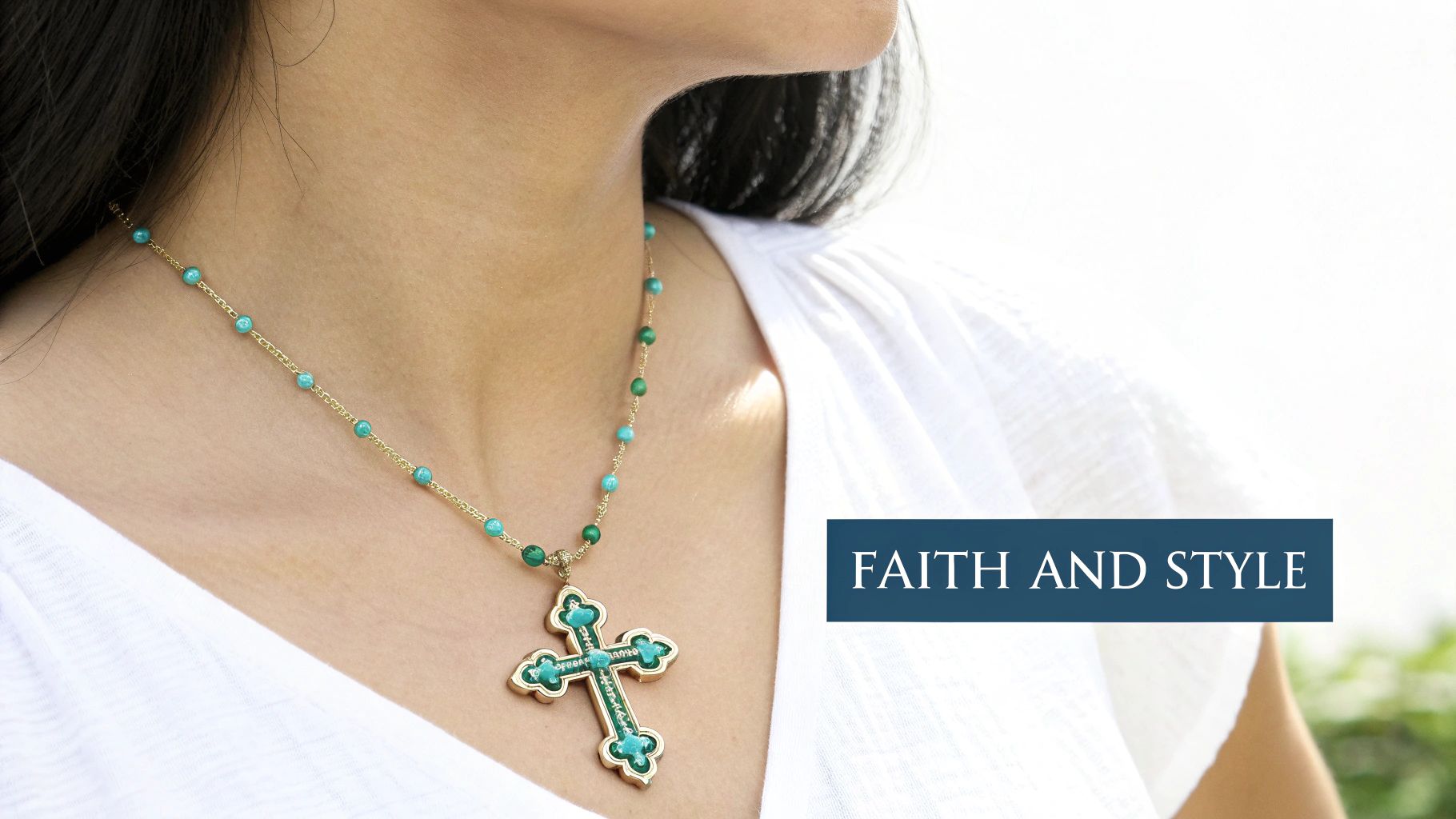 Close-up of a woman wearing an ornate gold and turquoise cross necklace with beaded chain.