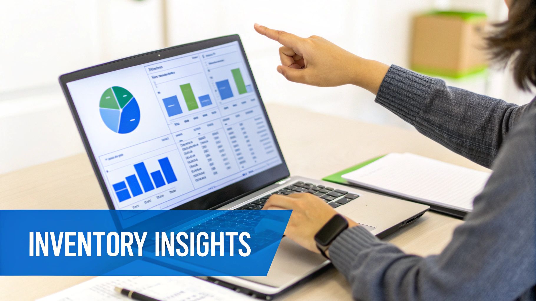 A business owner analyzing inventory data on a laptop and tablet, with charts and graphs visible.