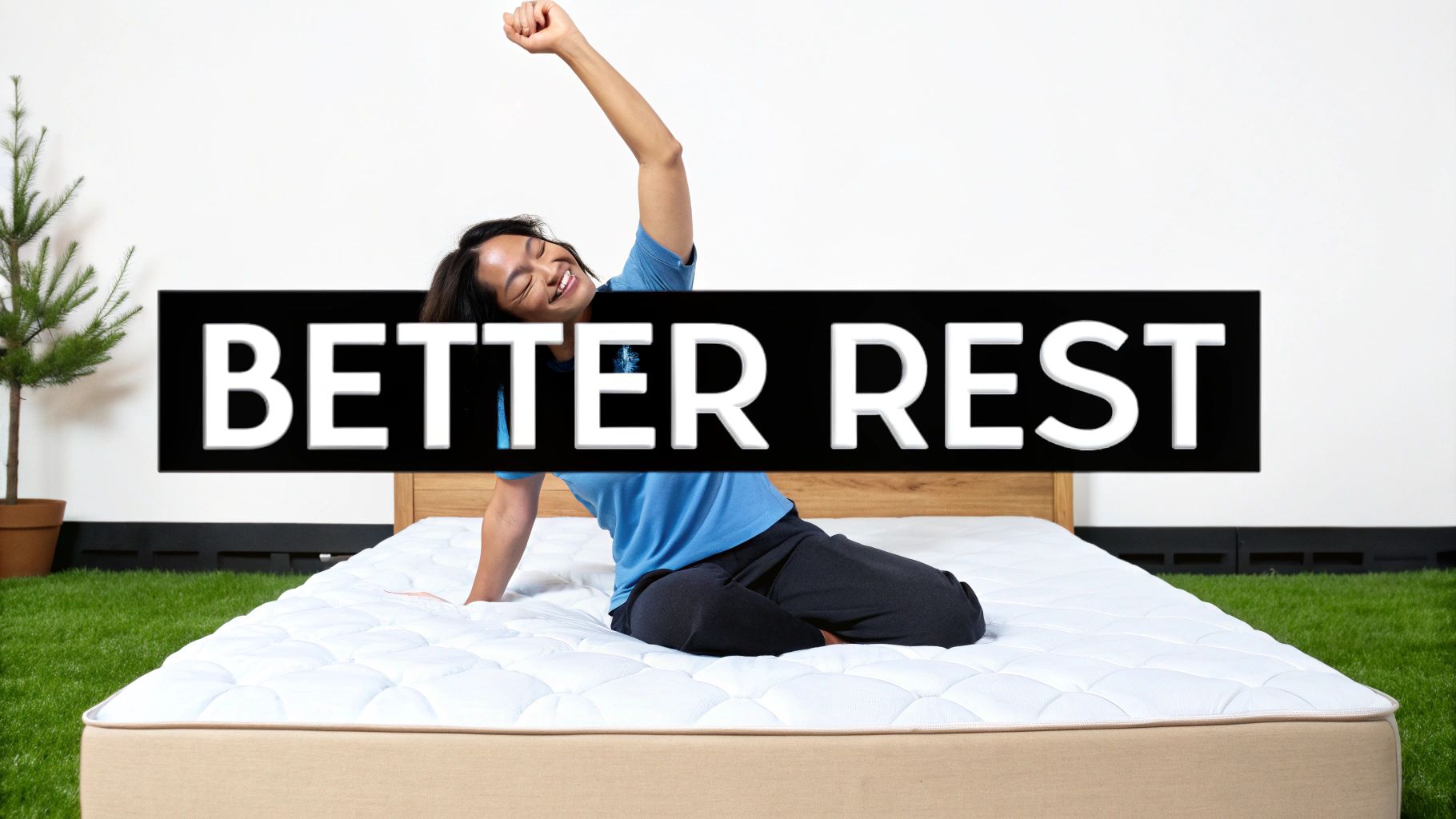 A person sleeping comfortably on a hybrid mattress in a bright, modern bedroom.