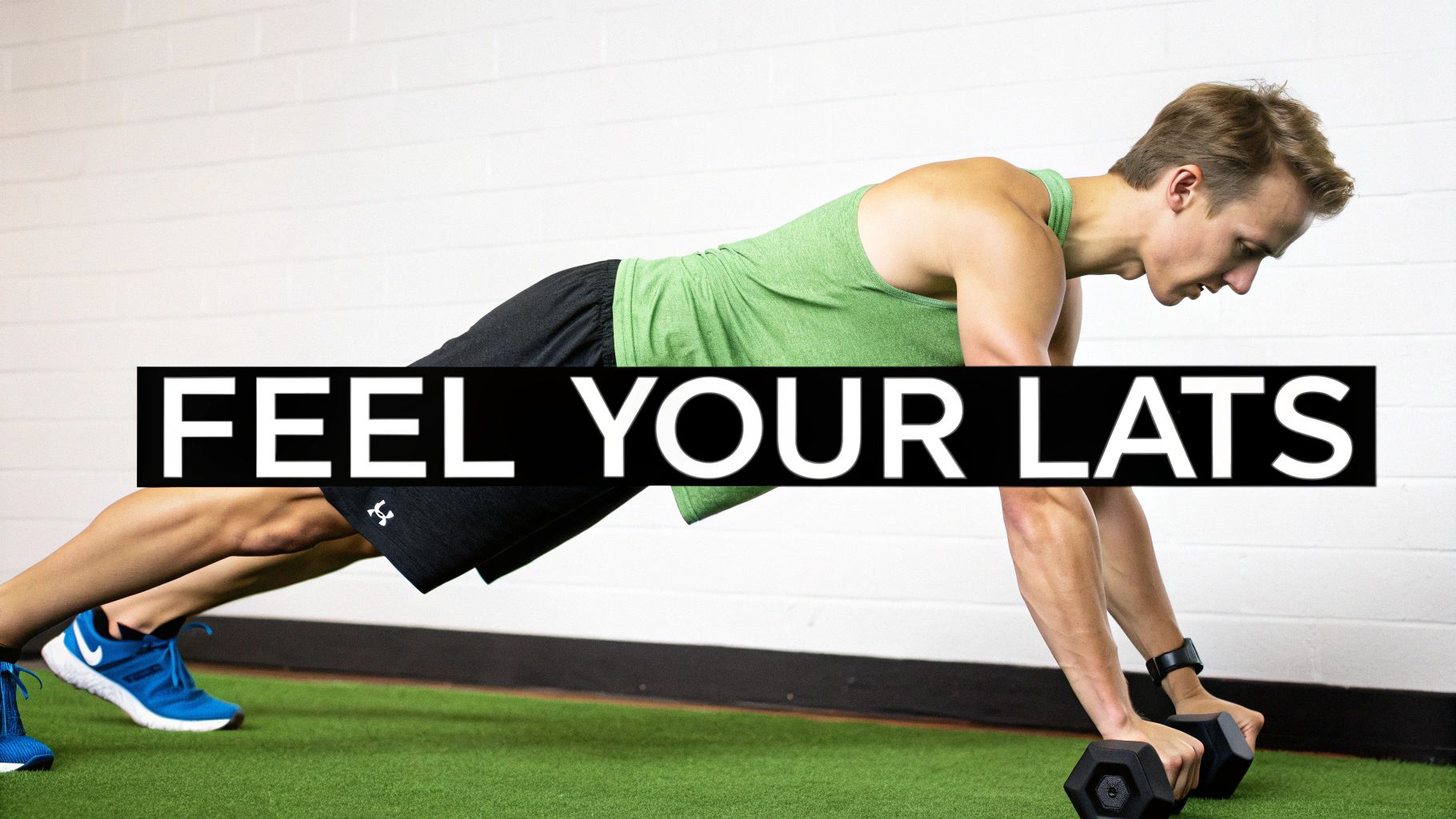 Woman in a gym setting performing a glute exercise with focused form.