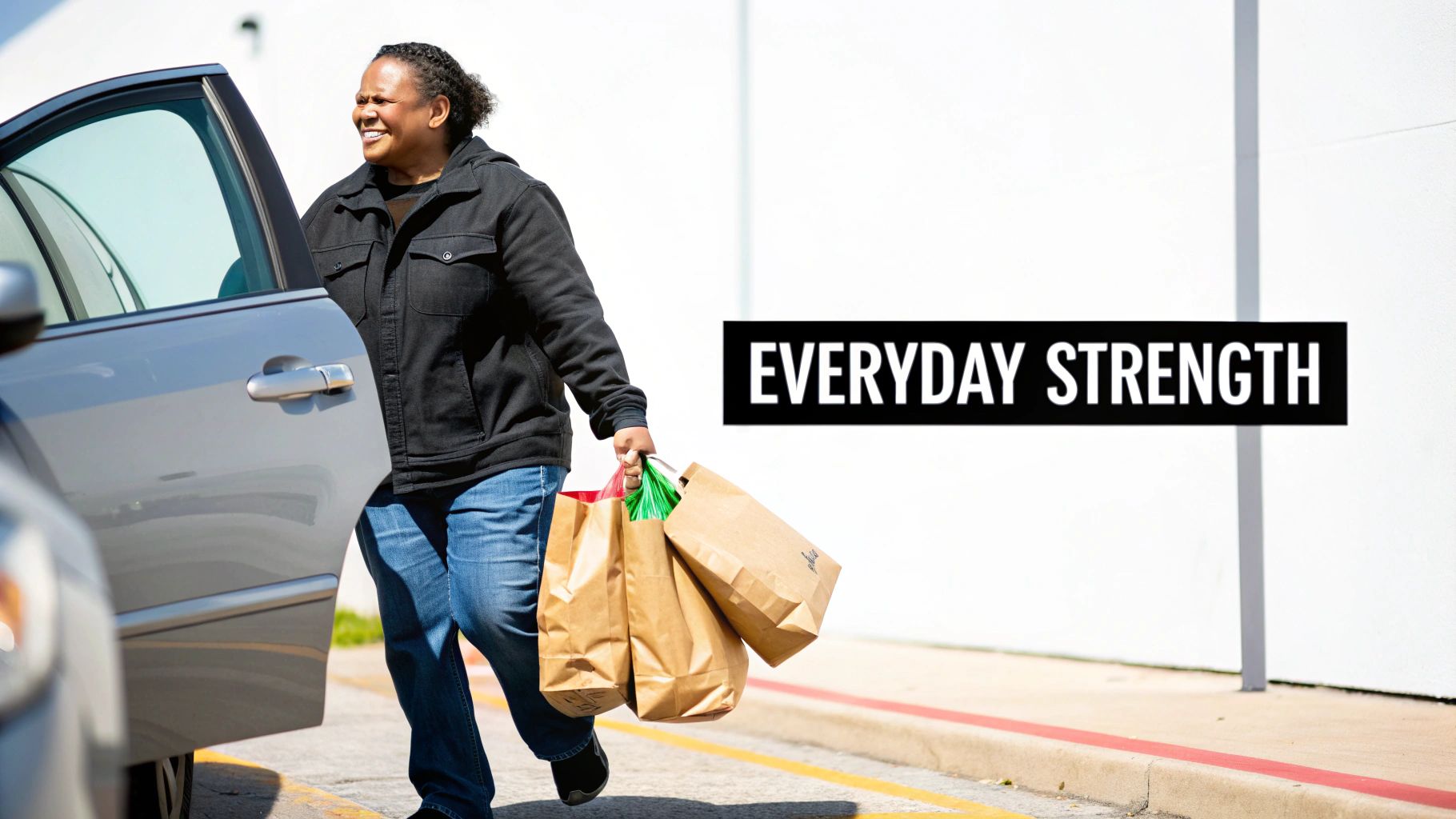 Woman lifting a dumbbell while performing a lunge in a modern gym.