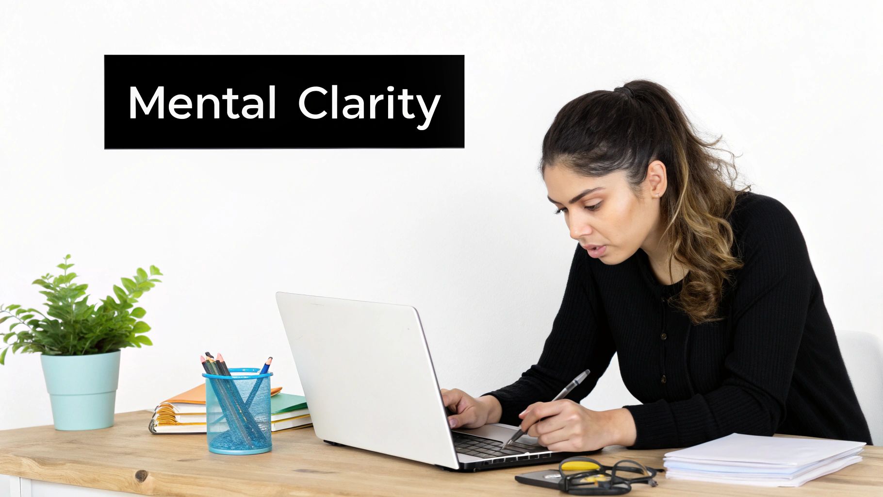 A woman looking focused and calm while meditating outdoors.