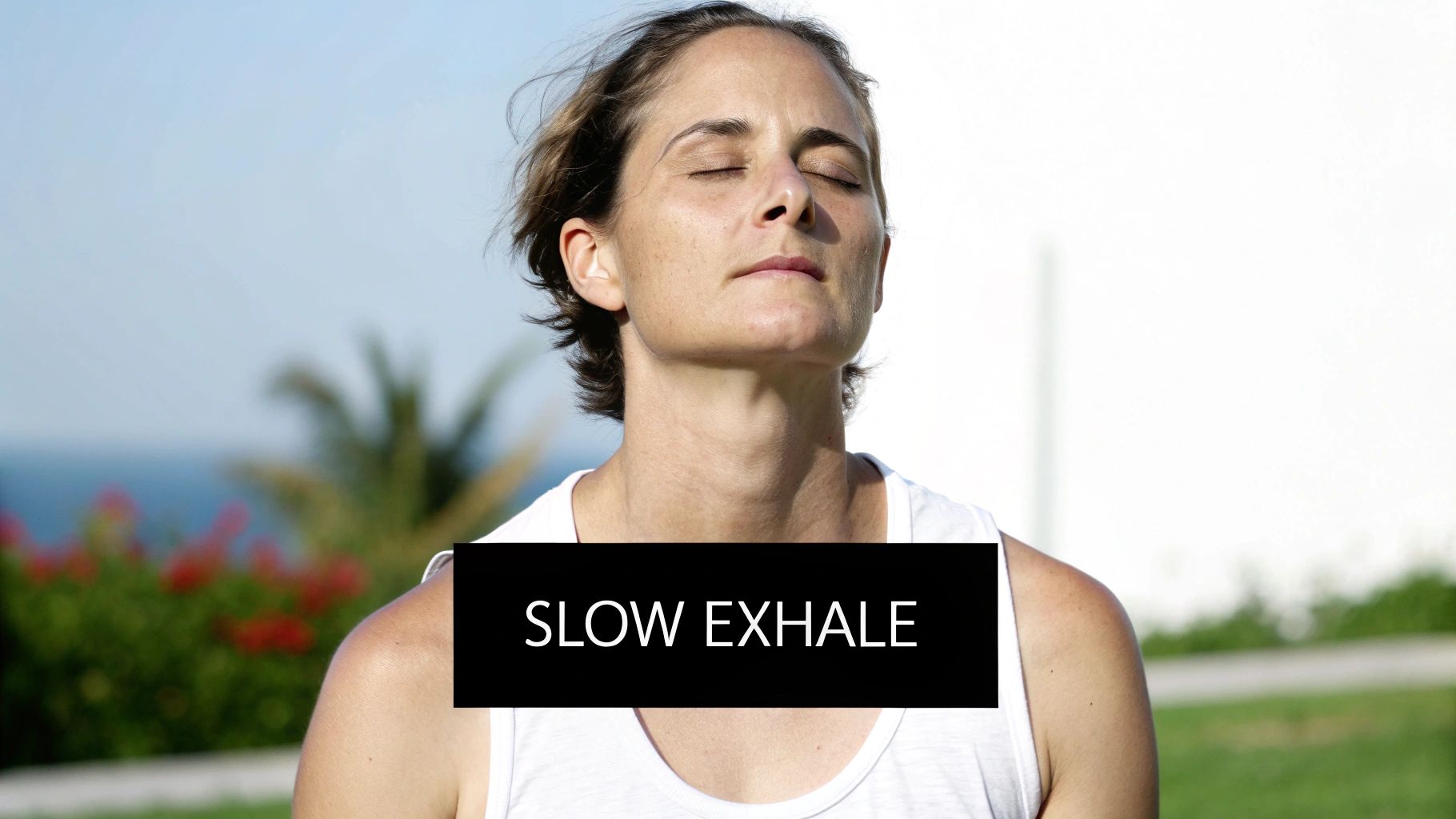 A woman with closed eyes practices a slow breathing exercise outdoors, with text overlay.