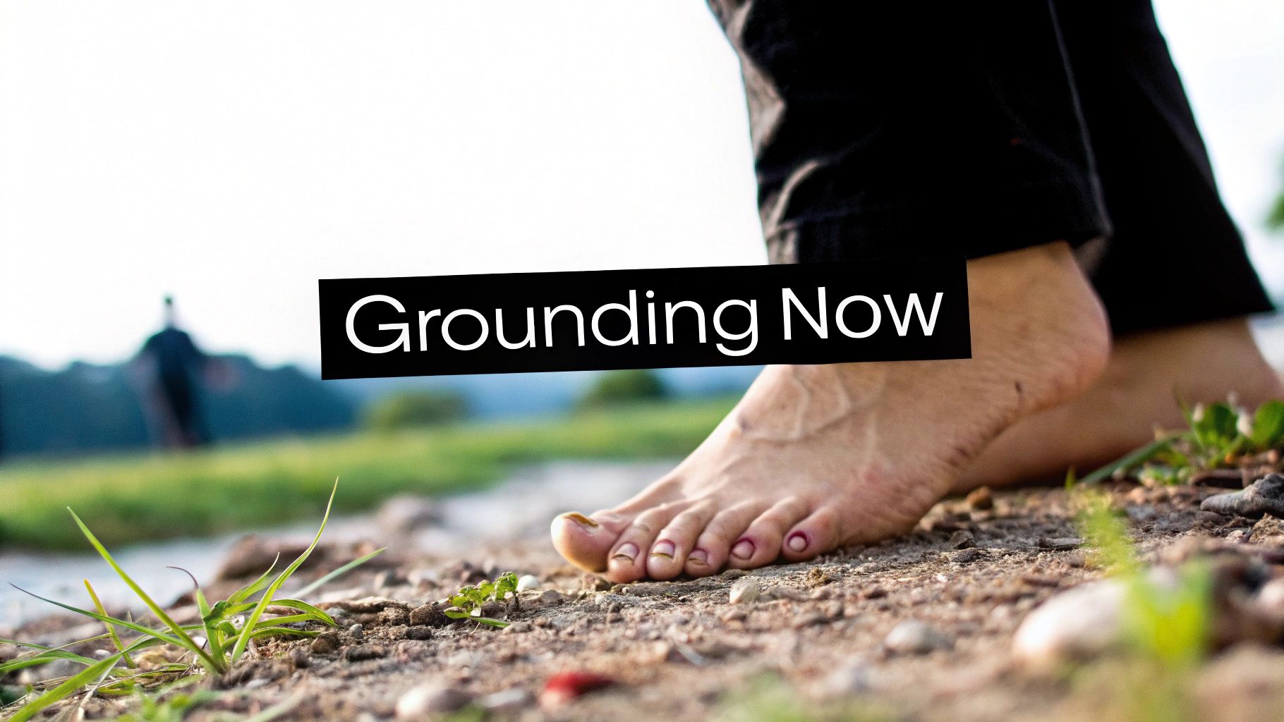 A person's bare feet are on the ground with some grass, with text 'Grounding Now'.