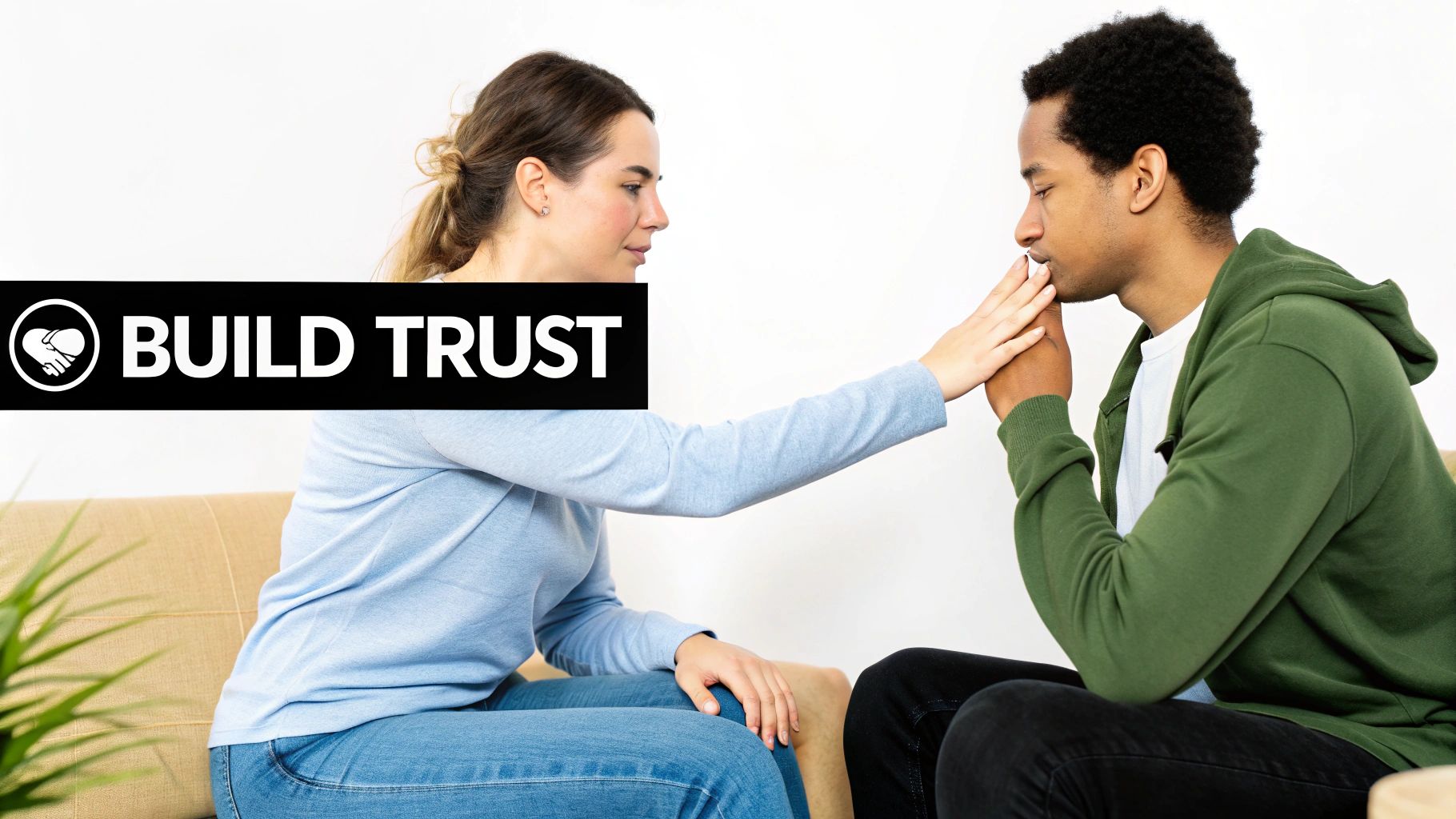 A woman comforts a man with a gentle hand touch, the image features 'BUILD TRUST' banner.