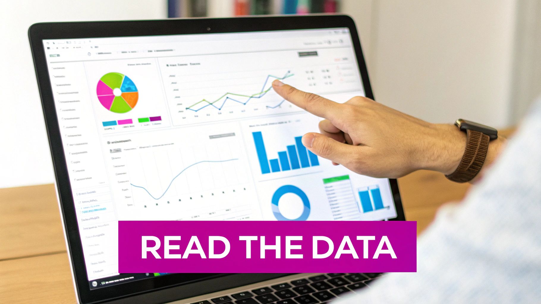 A person's hand points to various data charts and graphs on a laptop screen, analyzing information.