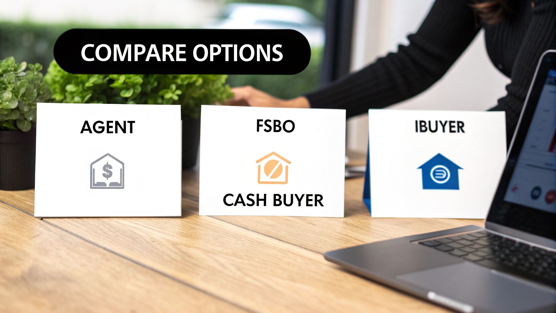 Three cards displaying options to sell a house: Agent, FSBO/Cash Buyer, and iBuyer, on a wooden desk.