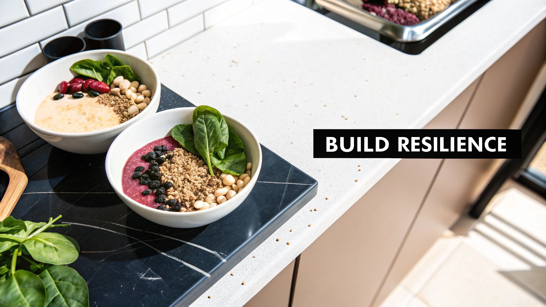 Two vibrant smoothie bowls with spinach, beans, grains, and berries on a white and dark counter.