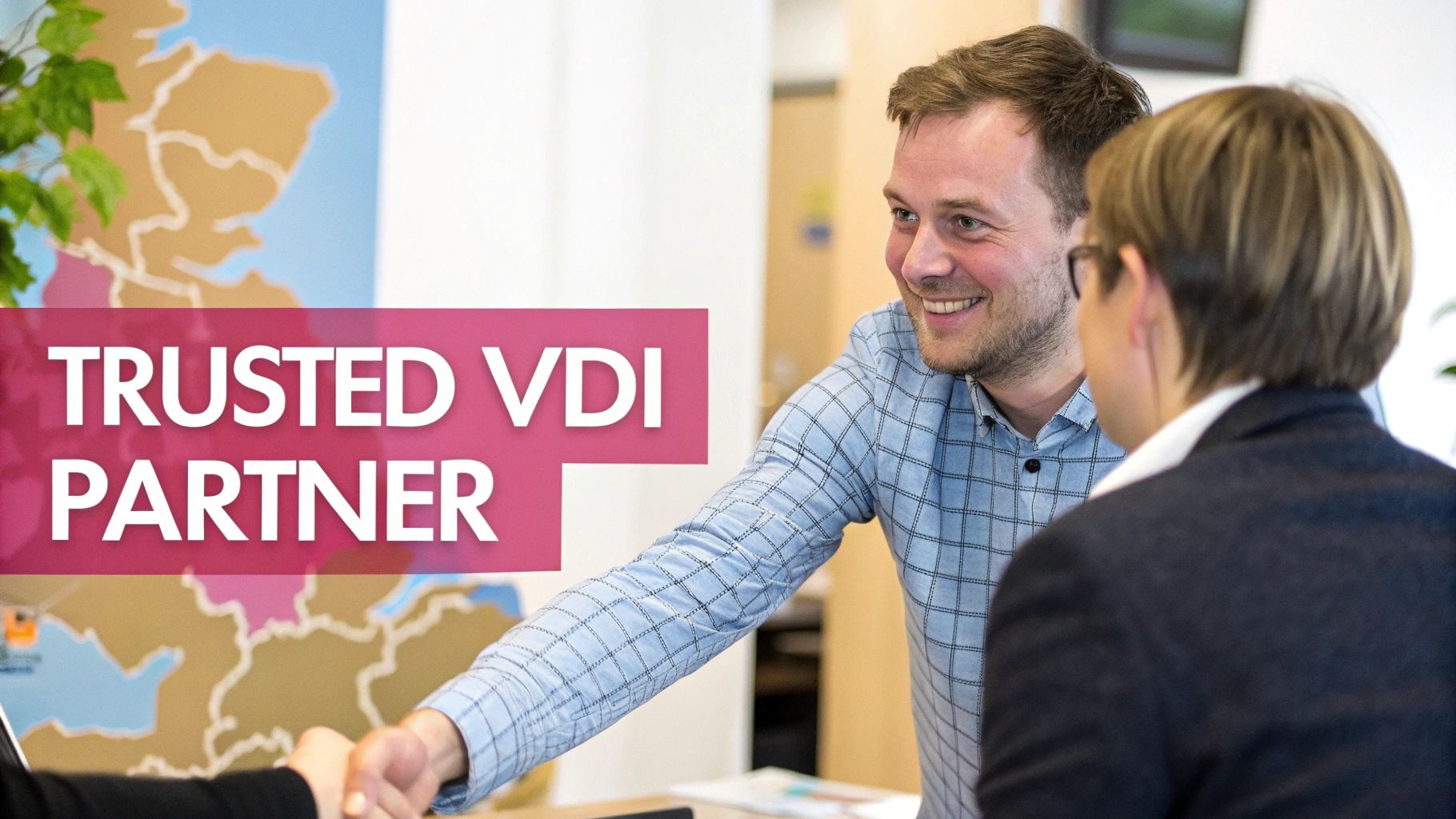 A Guide To Virtual Desktop Infrastructures For Uk Businesses Two Smiling Professionals, A Man And A Woman, Shake Hands Under A 'Trusted Vdi Partner' Banner.