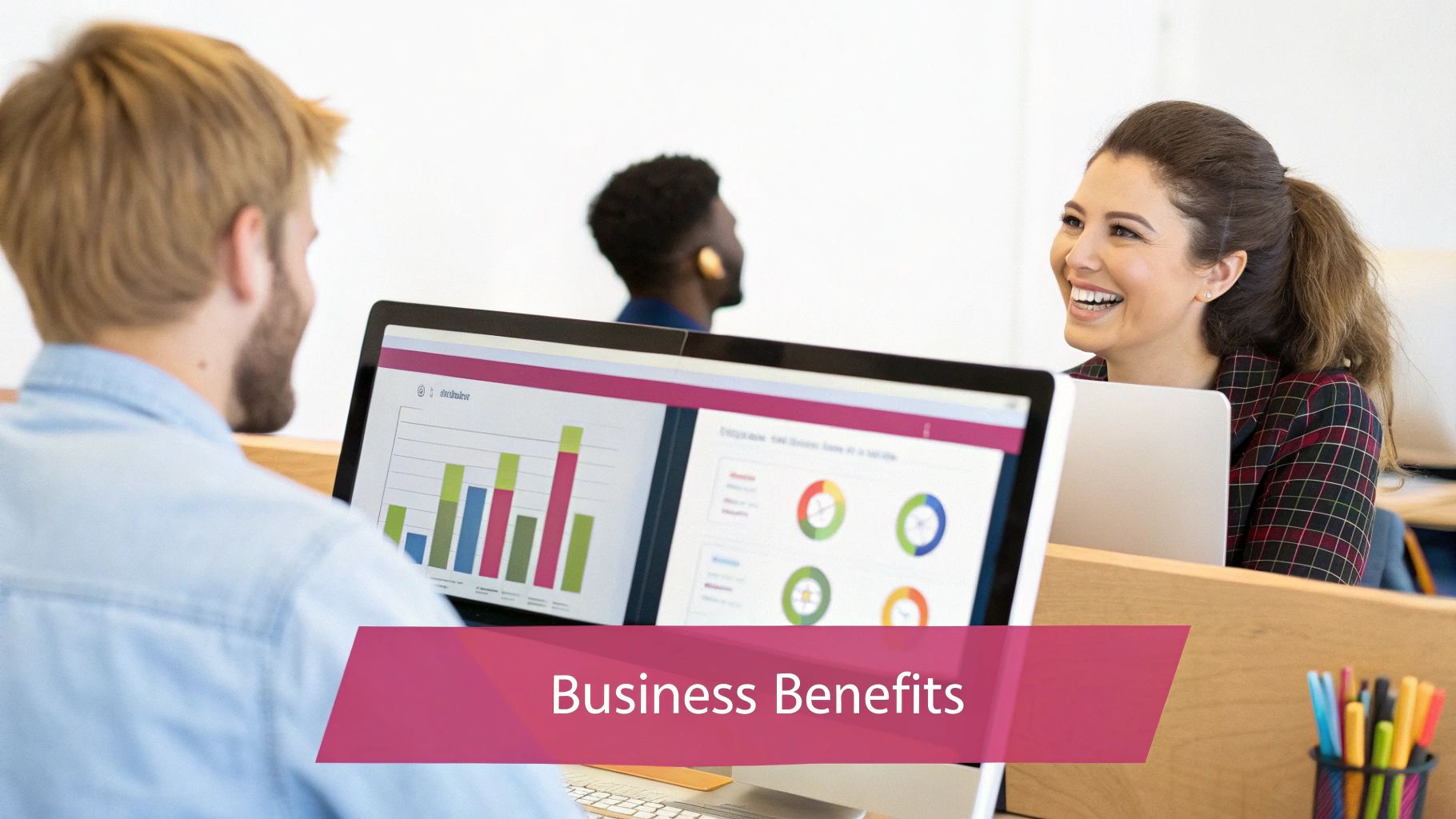 Your Guide To A Managed It Service Provider Happy Business Professionals Analyzing Data Charts On Computers In A Bright, Modern Office Environment.