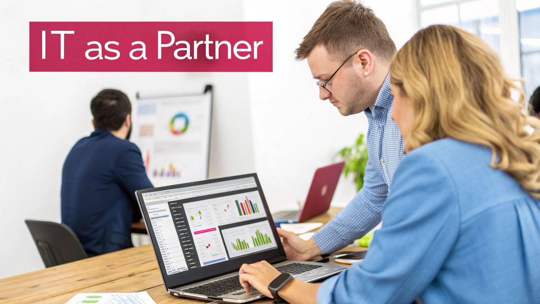 Two Business Professionals Collaborate On A Laptop Displaying Data Visualizations, Emphasizing It Partnership.