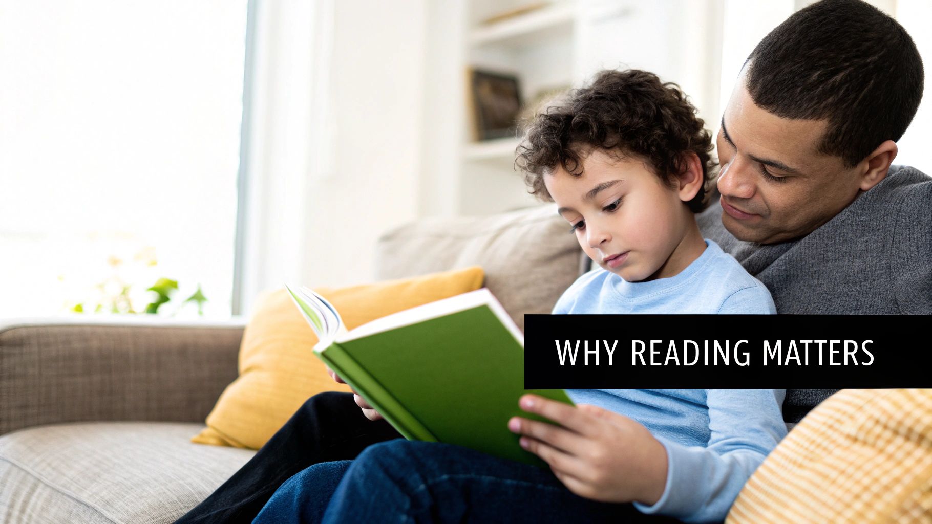 A young girl engrossed in a picture book while sitting on a comfortable chair.
